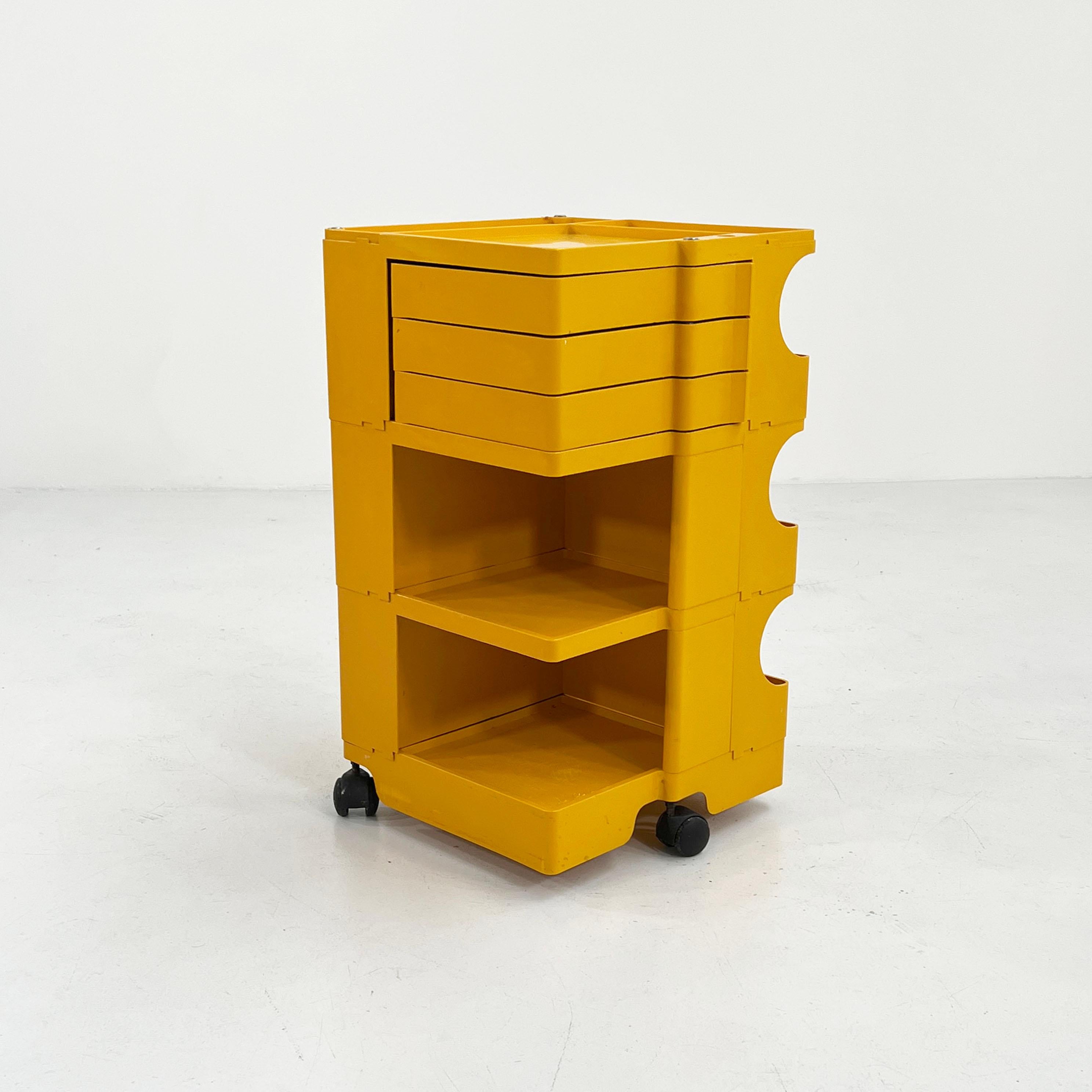 Designer - Joe Colombo 
Producer - Bieffeplast
Model - Boby Trolley
Design Period - Sixties
Measurements - Width 41 cm x Depth 39 cm x Height 74 cm
Materials - Plastic
Color - Yellow
Light wear consistent with age and use.