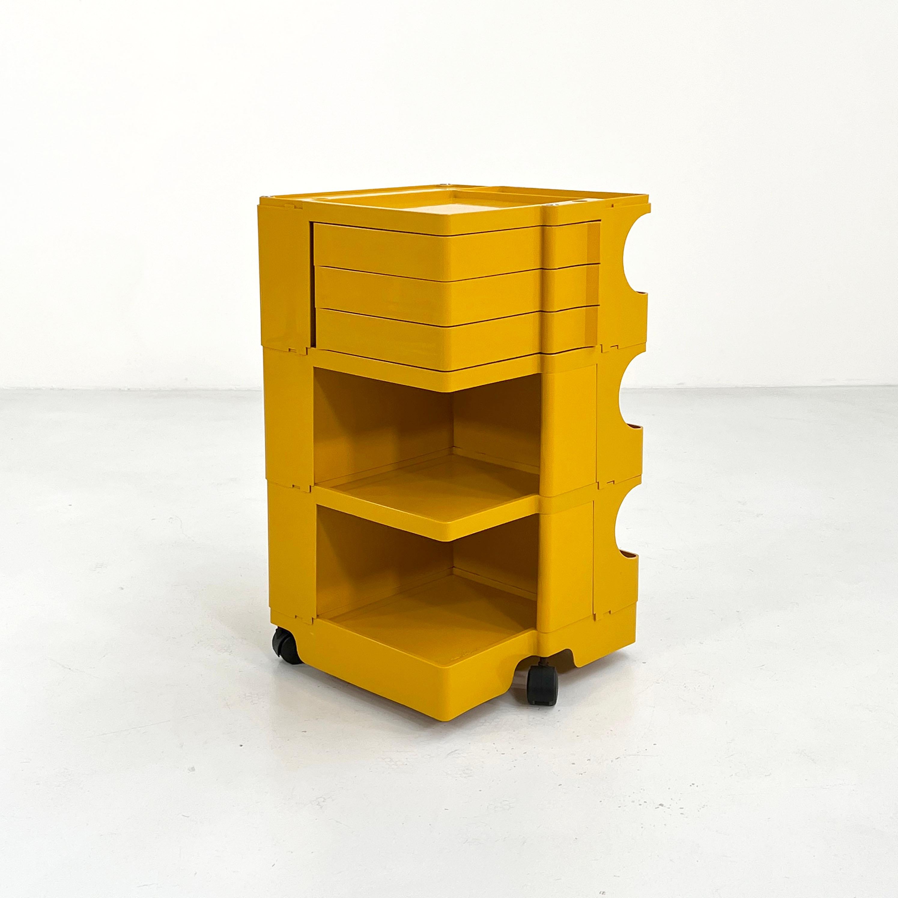 Designer - Joe Colombo 
Producer - Bieffeplast
Model - Boby Trolley
Design Period - Sixties
Measurements - Width 41 cm x Depth 39 cm x Height 74 cm
Materials - Plastic
Color - Yellow
Light wear consistent with age and use.