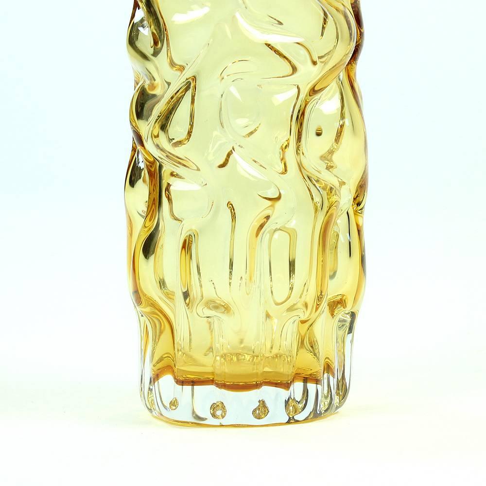 Beautiful art glass vase. The glass is metallurgical, hand molded glass in yellow color. Designed by Pavel Hlava in 1968. Model was originally named The Brain vase. Obviously takes a name after the original, yet a beautiful shape which is supposed