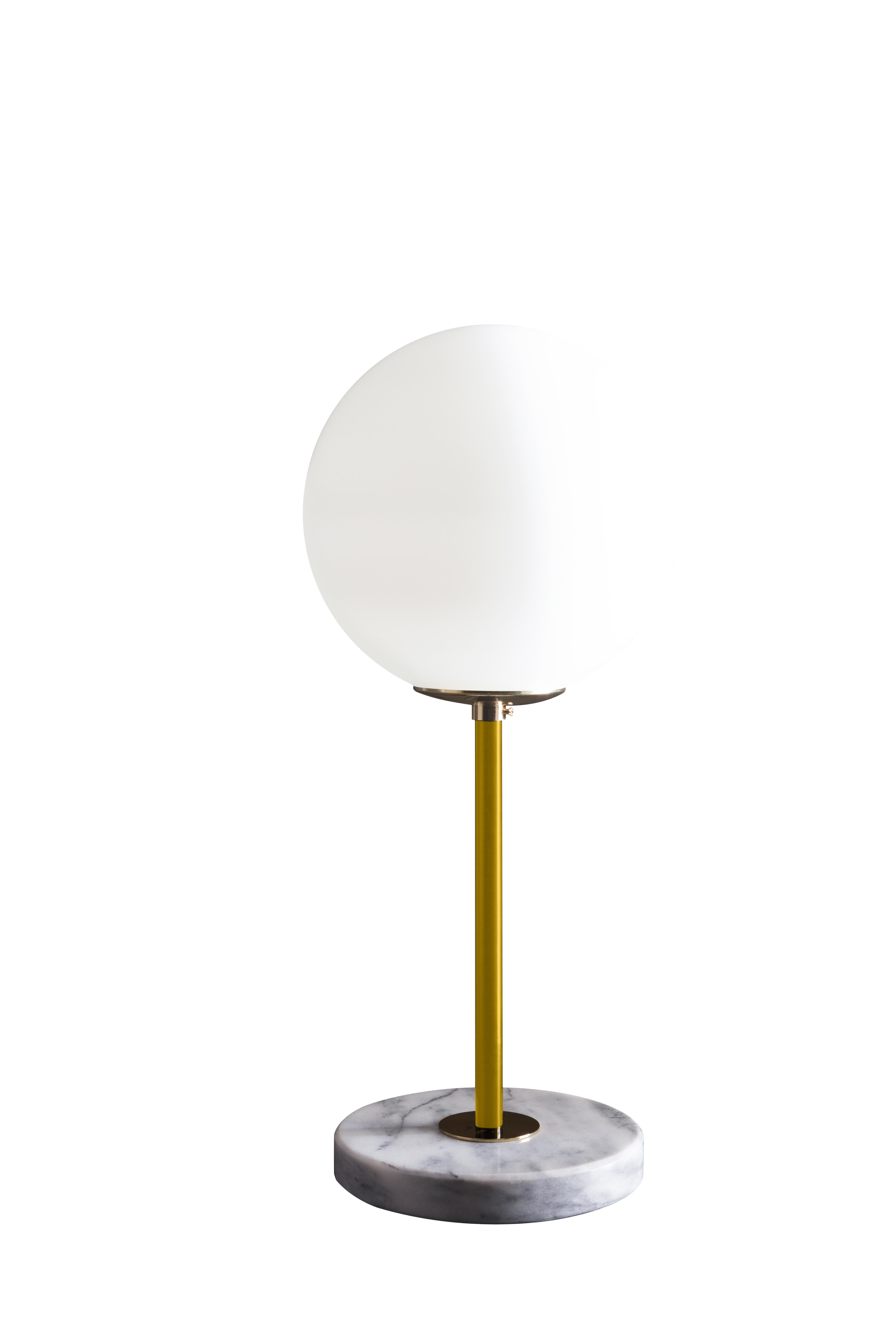 Yellow brass table lamp 06 by Magic Circus Editions
Dimensions: H 50 x W 22 cm
Materials: Smooth brass, mouth blown glass

Available finishes: Brass, nickel
Available colors (central tube): Black, green pine, red wine, mustard yellow, and