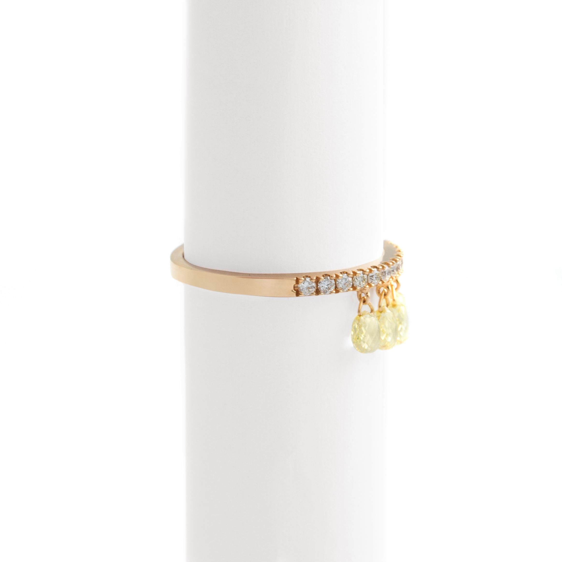 Band Ring in rose gold 18K briolette cut yellow and round cut diamonds 2.01 carat, estimated H color and Si1 clarity.
Total gross weight: 2.27 grams.

Size:  54