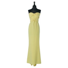 Vestido de noche corpiño amarillo con 2 lazos en el pecho Boutique MOSCHINO  NUEVO