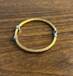 Bracciale giallo The Row in oro bianco 18 carati con diamanti, filigrana e dichiarazione attorcigliata
