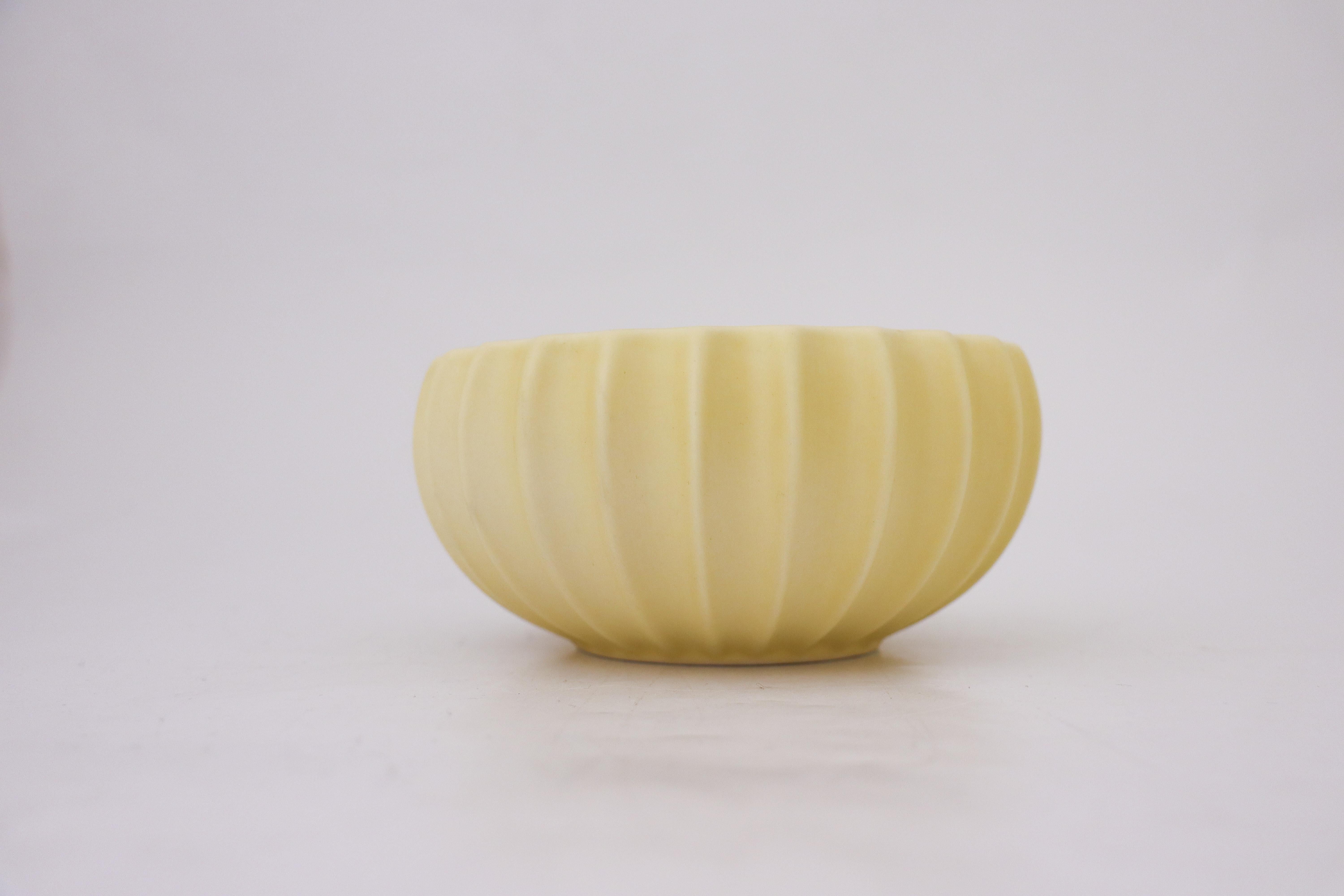 A lovely yellow bowl designed by Pia Rönndahl at Rörstrand in the 1980s. The bowl is 7 cm (2.8