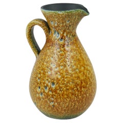 Yellow Ceramic Pitcher in the style of Accolay