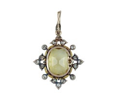 Yellow Ceylon Sapphire and diamond pendant, circa 1910.