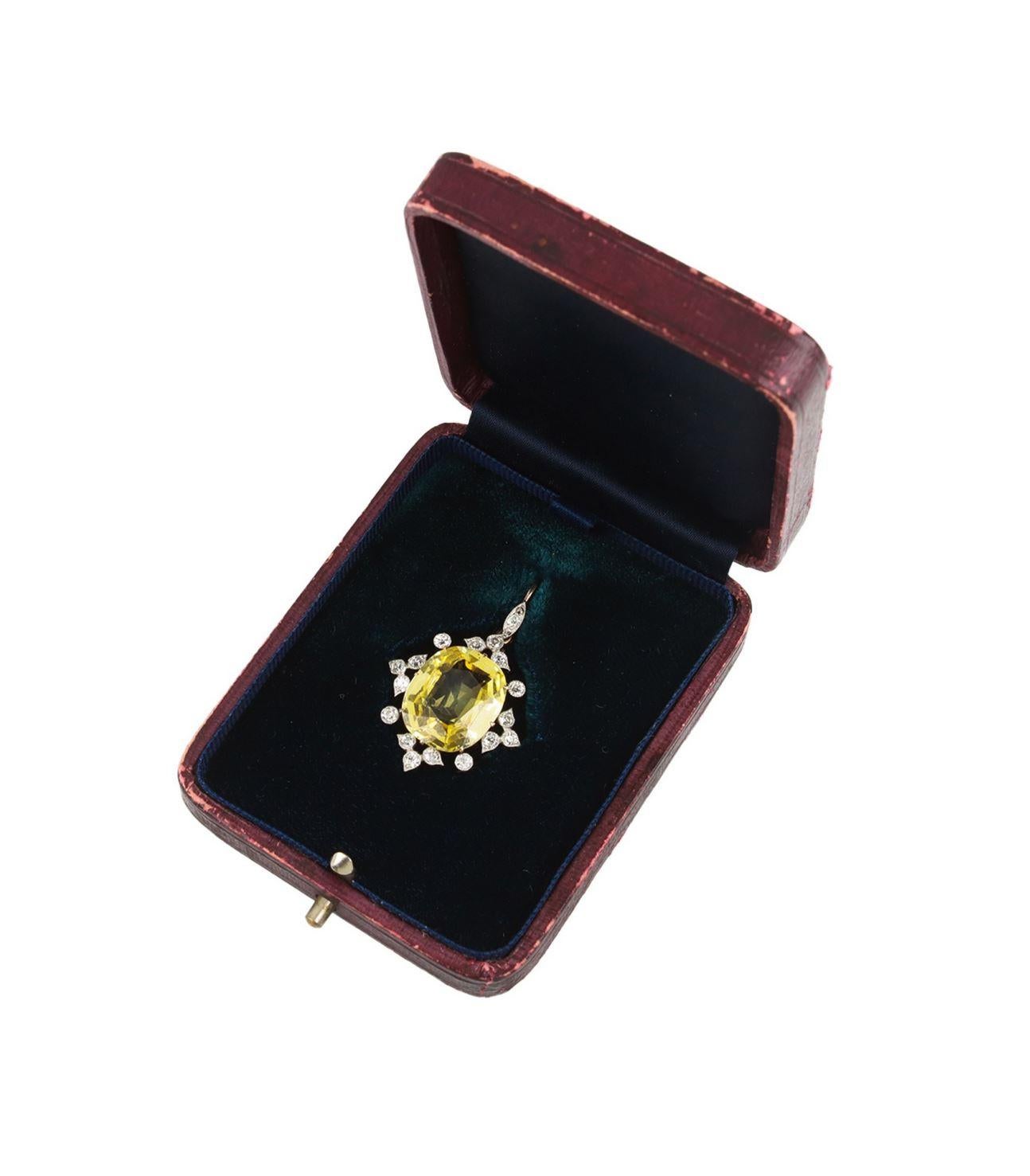 Antique Cushion Cut Yellow Ceylon Sapphire and diamond pendant, circa 1910. For Sale