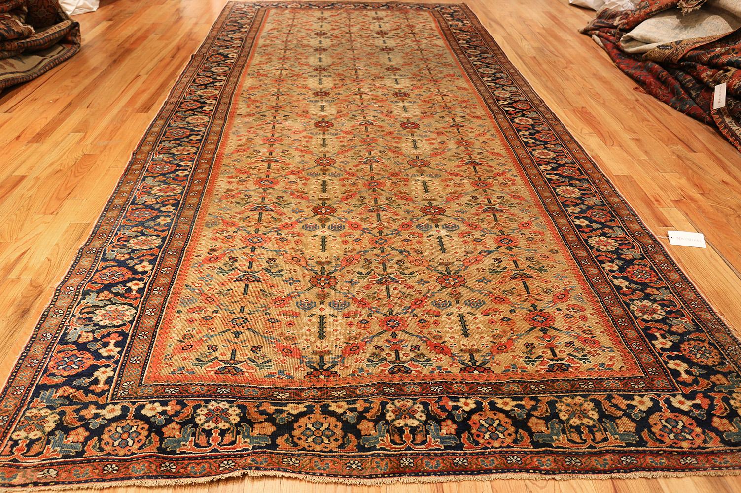 Breathtaking yellow background antique Sultanabad Persian rug, country of origin/rug type: Persian rug, circa 1900. Size: 7 ft 3 in x 15 ft (2.21 m x 4.57 m)

