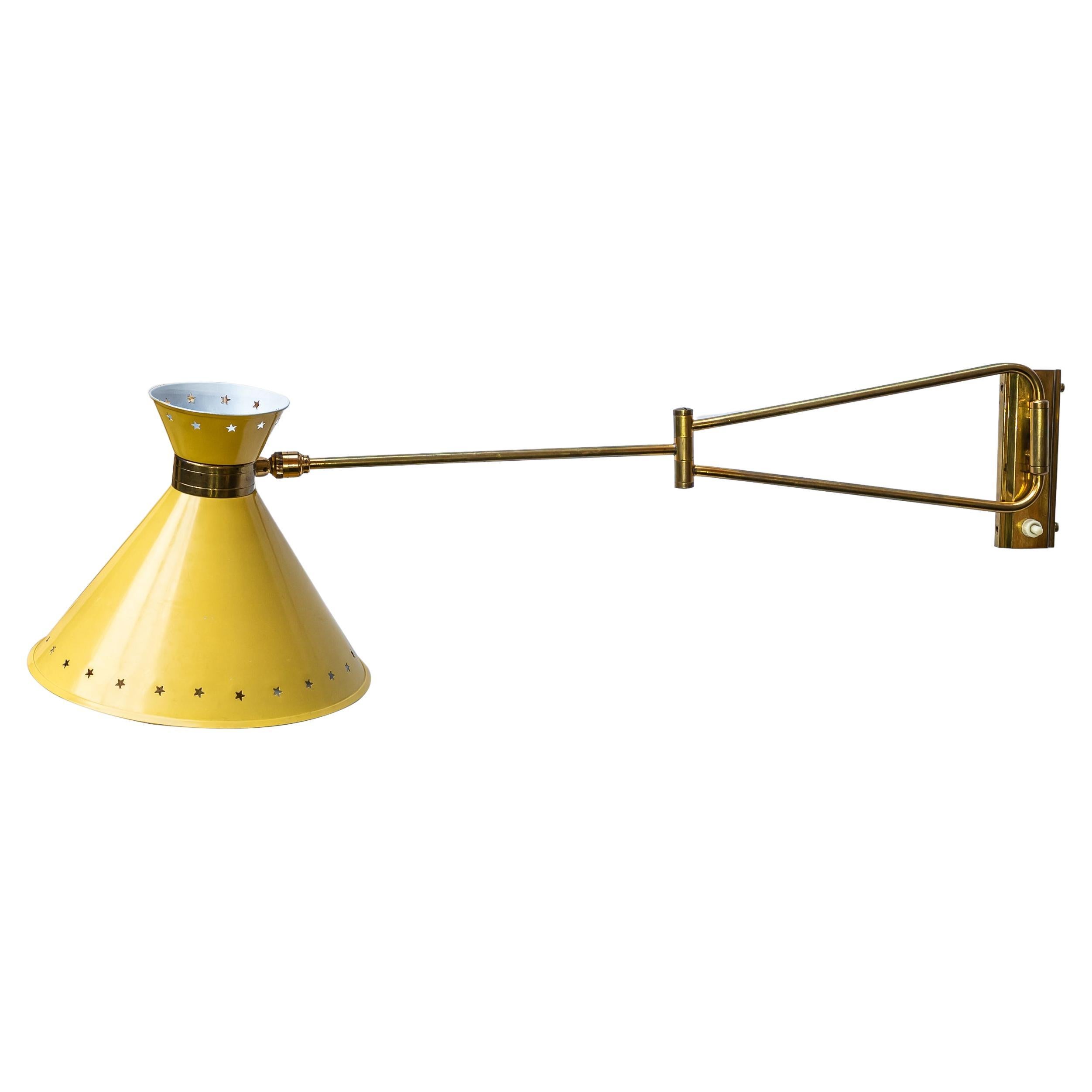 Yellow color enamelled shade wall lights by Rene Mathieu for Lunel sconce For Sale