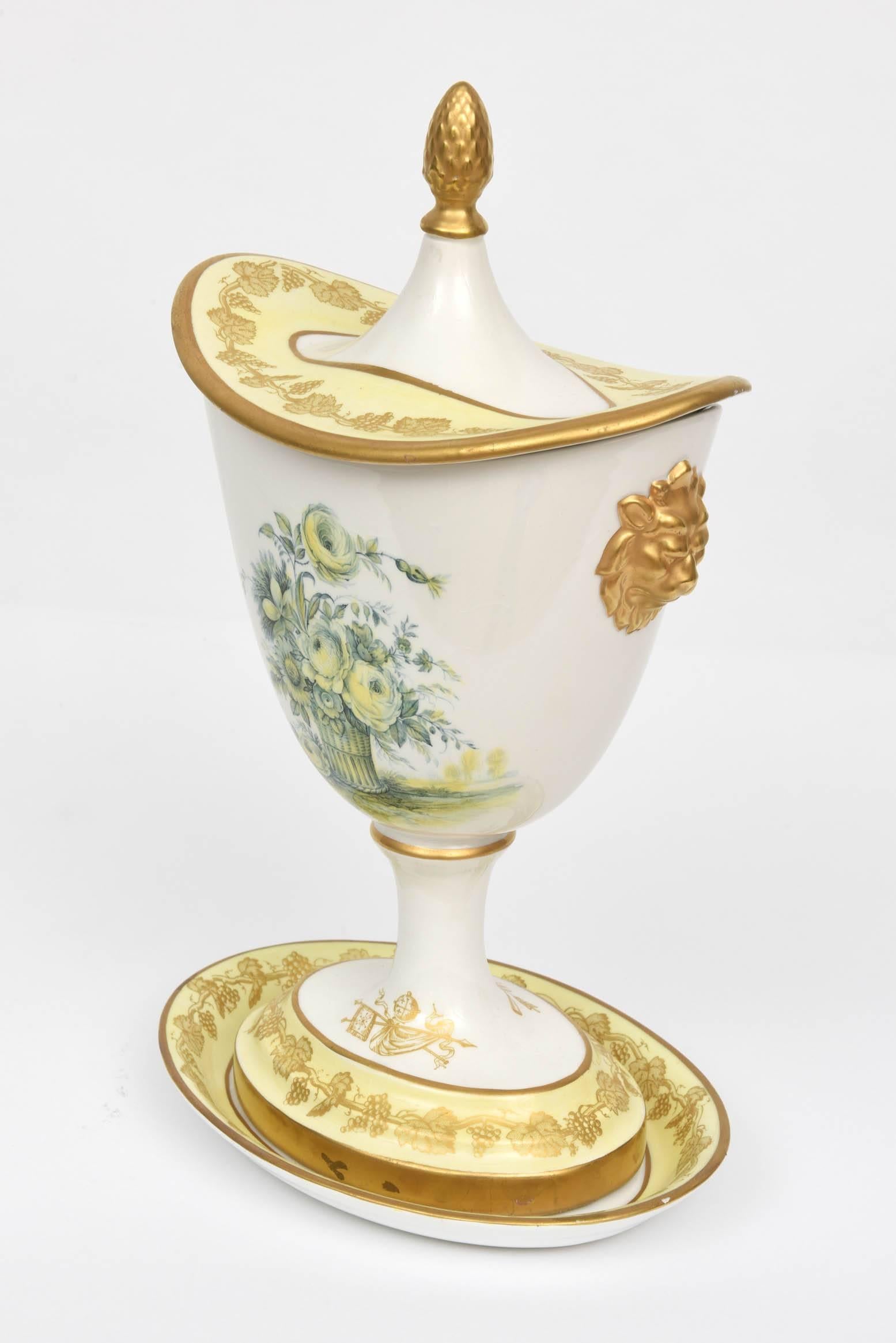 An interesting three part vase set featuring a fitted oval cover, pedestal base and under tray. Nice detailing from Mottadeh whose realistic depictions of antique patterns are world re known. Please see the other coordinating pieces. Very nice