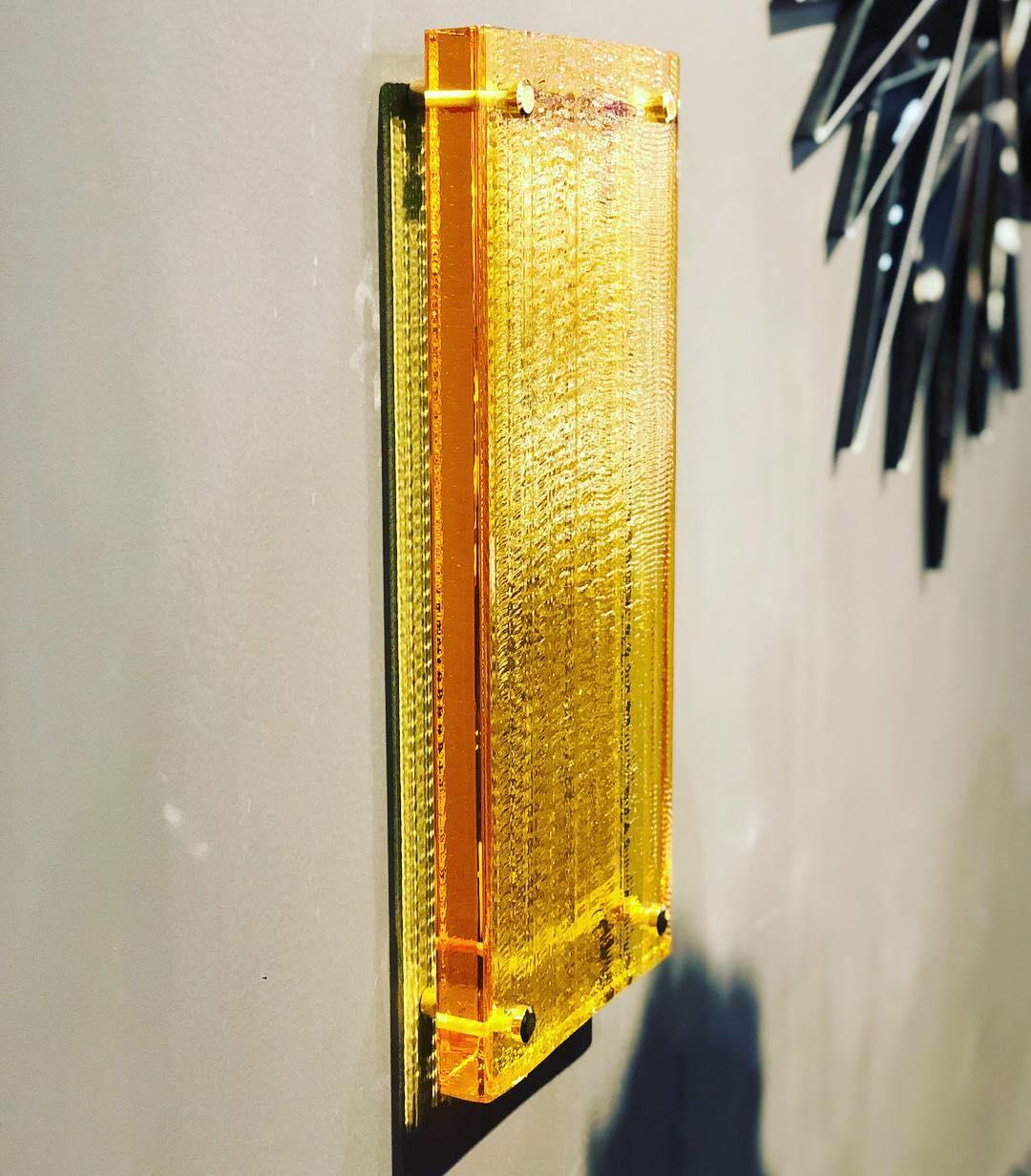 Yellow crystal wall suspension, hand-sculpted contemporary crystal
Decorative vase
Hand-sculpted in crystal
Measures: W 23, H 52, D 3 cm

A striking three-dimensional structure that transform entire environment with dazzling, abstract beams of