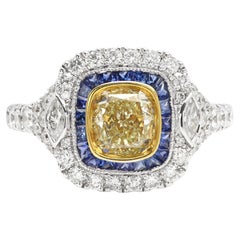 Bague Art déco en or 18 carats 1,21 carat diamant jaune et saphir bleu
