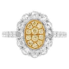 Bague de fiançailles en platine avec diamant jaune et diamant blanc