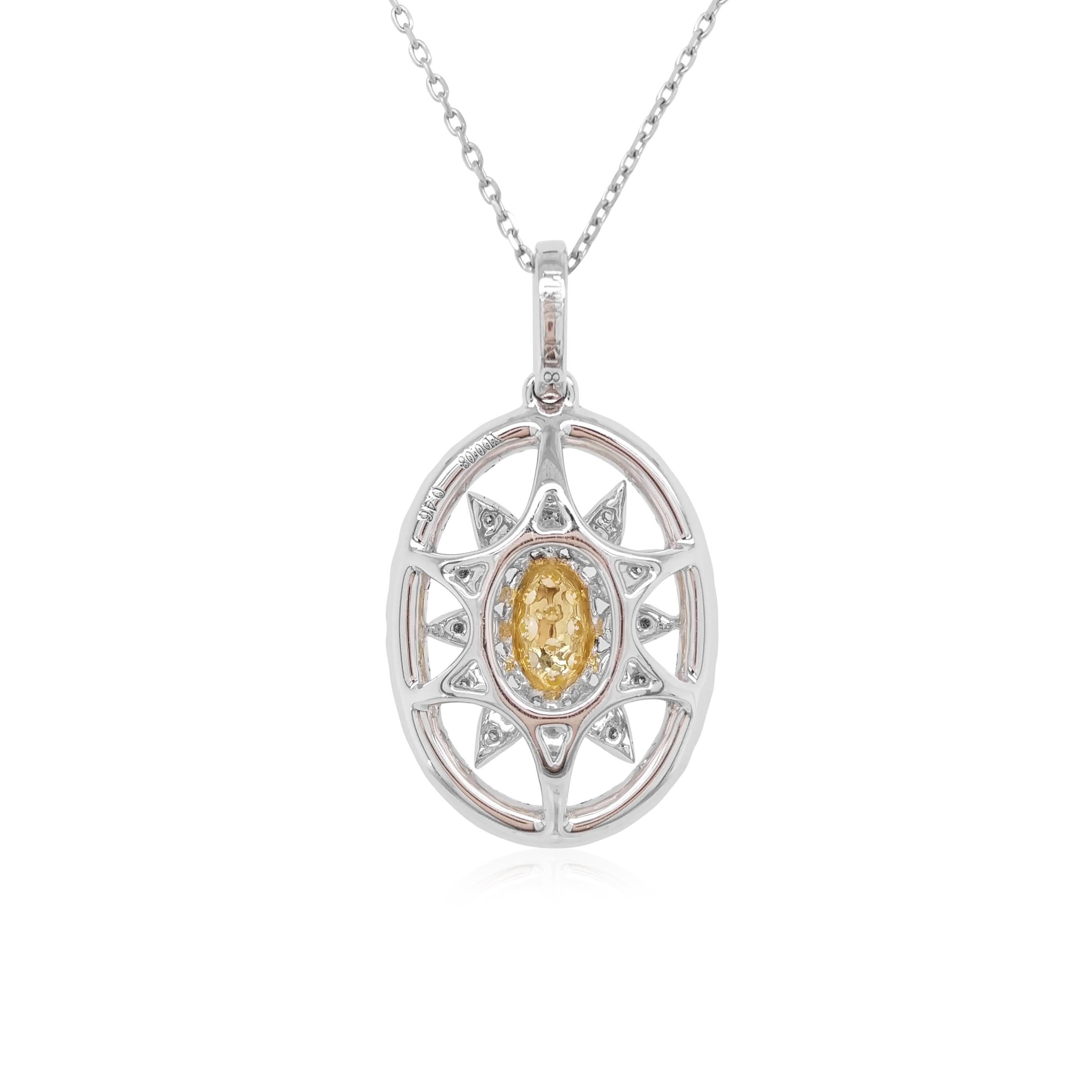 This unique pendant features striking natural Yellow diamonds at its centre, surrounded by a bold pattern scintillating white diamonds. The perfect piece to take you from day to night, this pendant will elevate any outfit - especially when paired