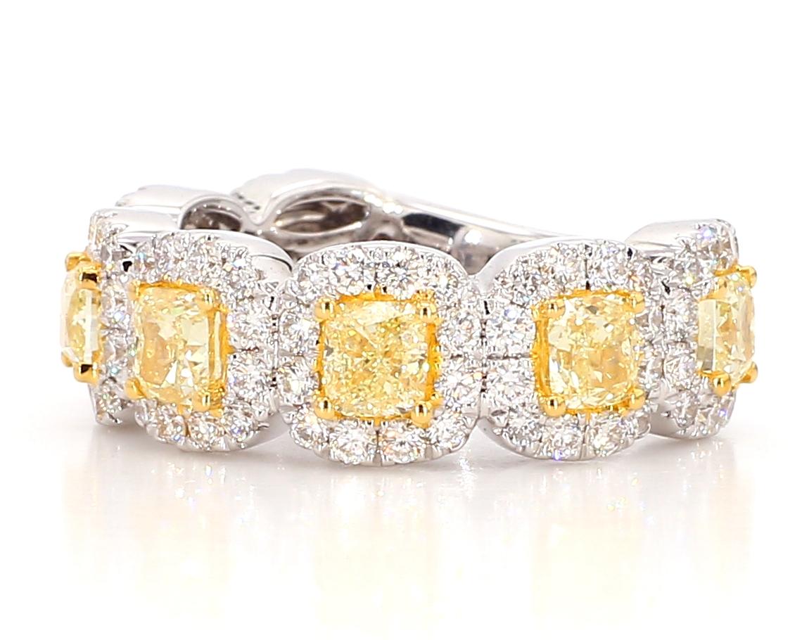 This Fancy Yellow Diamond three quarters Eternity Band with a diamond halo is a testament to fine craftsmanship and timeless design. Perfect for those who appreciate the beauty of natural diamonds, this ring offers a balance of luxury and tasteful