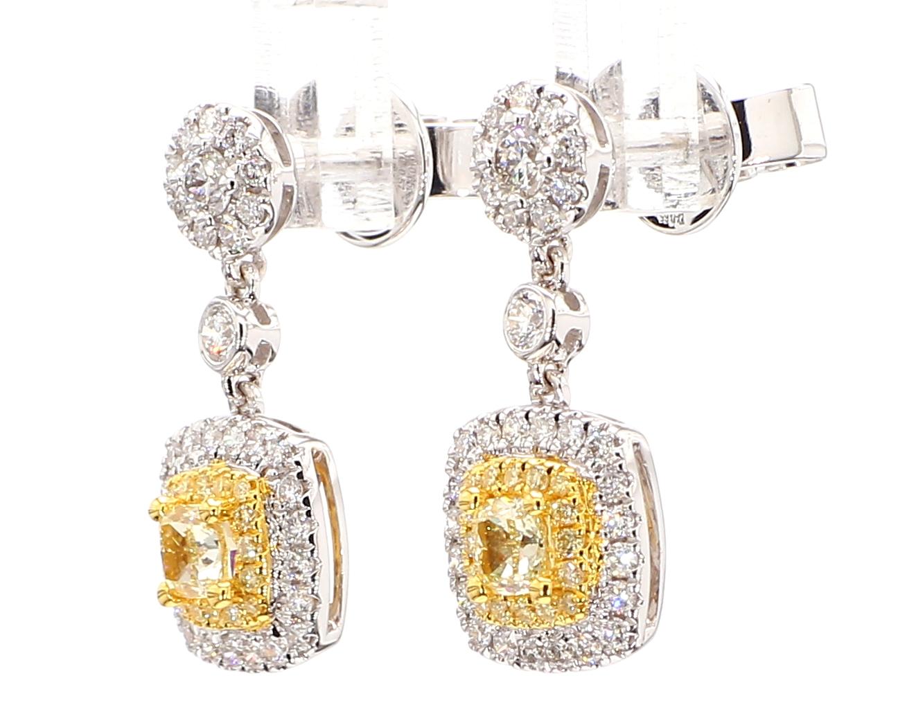 This Fancy Yellow Diamond cushion cut dangle earring is a testament to fine craftsmanship and timeless design. Perfect for those who appreciate the beauty of natural diamonds, these earrings offers a balance of luxury and tasteful simplicity.
