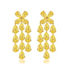 Orecchini a goccia con diamante giallo