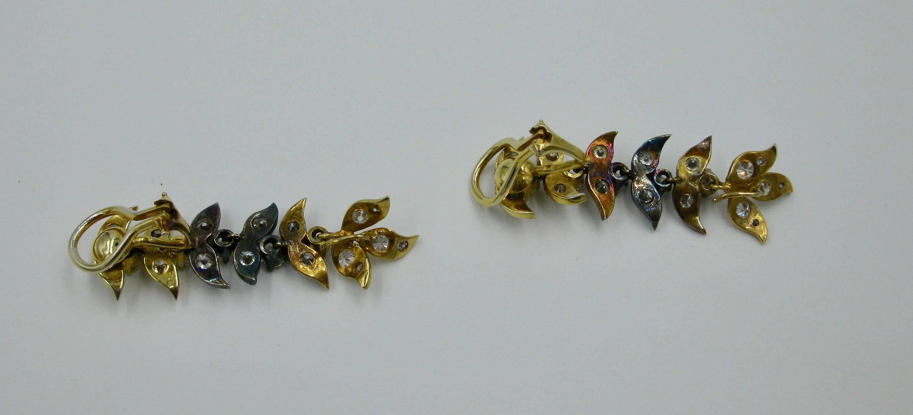 Round Cut 4.55 Carat Yellow Diamond Earrings VS Modern Articulated Leaf Design 14 Karat For Sale