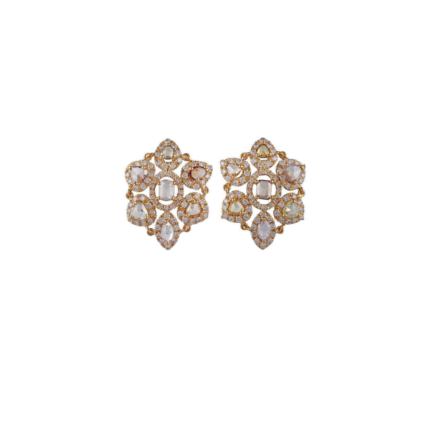 An exclusive pair of earrings with rose cuts yellow diamond weight 2.80 carats with the clusters of round brilliant cut diamonds weight 1.50 carats, the entire earrings are studded in 18K yellow gold weight 6.32 grams. These earrings have a simple