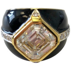 Yellow Diamond Emerald Cut and White Diamond Rounds in 18 Karat and Black Enamel