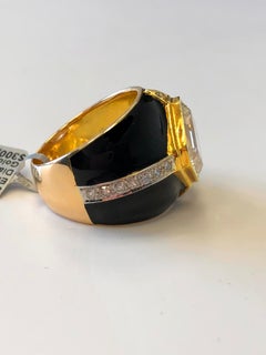 Yellow Diamond Emerald Cut and White Diamond Rounds in 18 Karat and Black Enamel