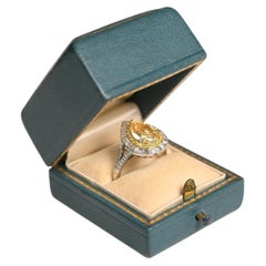 GIA 2.75ct Pear Shaped Fancy Yellow Diamond Ring. Diamond Halo Ring Platinum