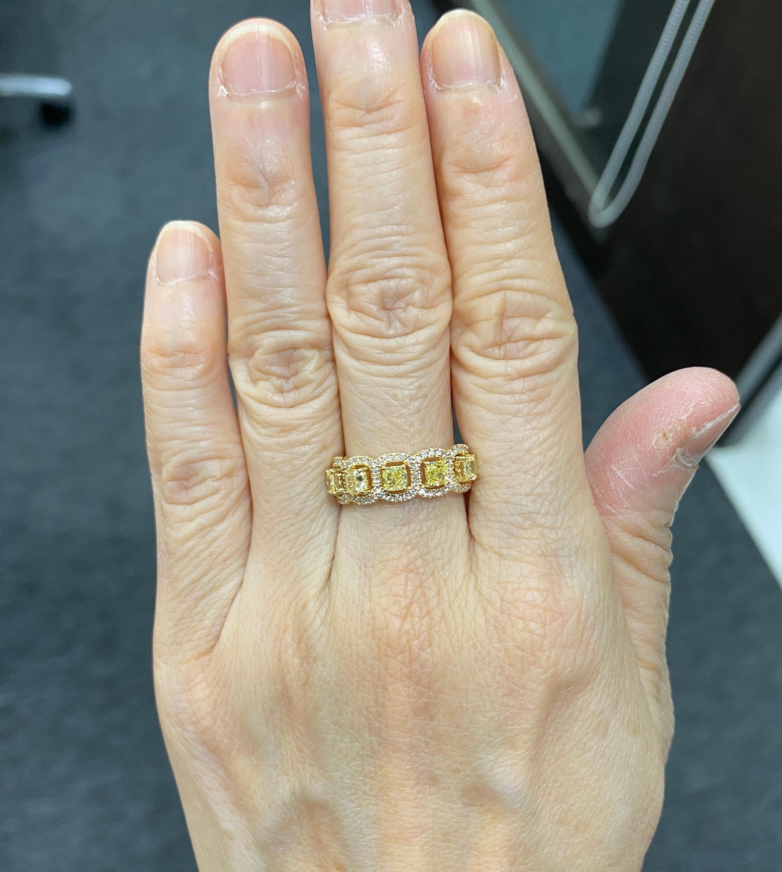 Yellow Diamond Half Eternity Ring 18 Karat Yellow Gold 

Magnificent Yellow diamond band, features 1.10 Carats of Yellow Cushion Cut Diamonds, surrounded by 0.25 Carats of white round brilliant cut diamonds. 

Ring Size Europe 54 (US 6.75) ,
Ring