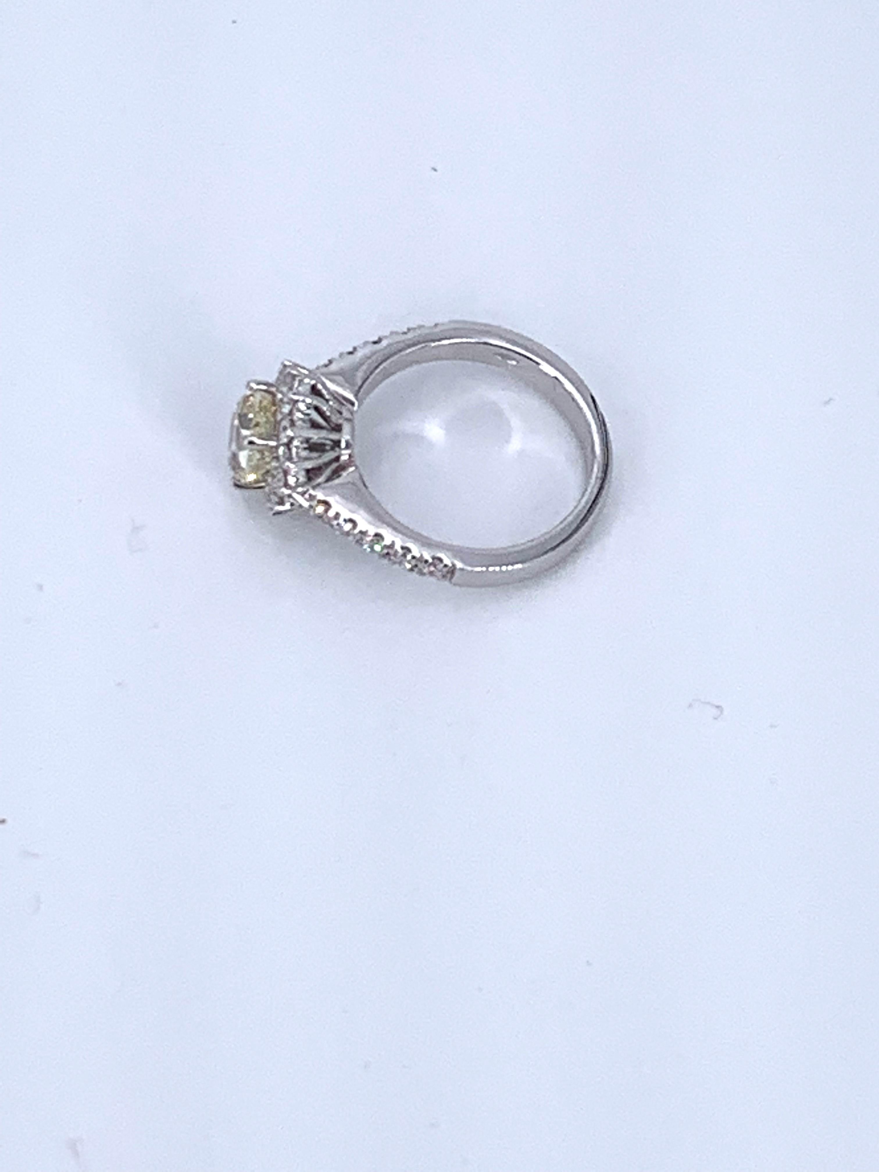 Artisan Yellow Diamond GIA Certified 1.64 Carat set in 18Kt White Gold Ring