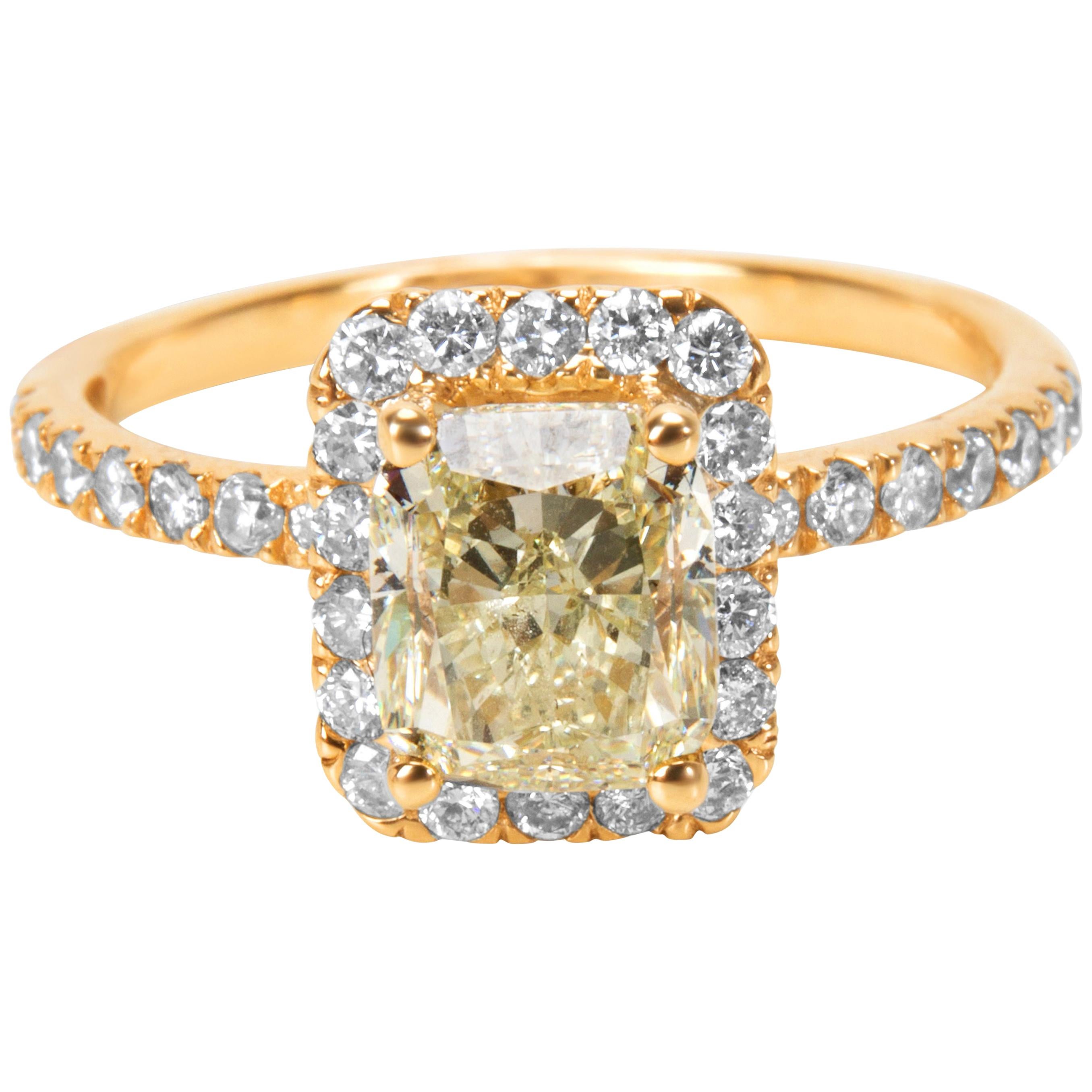 Yellow Diamond Halo Engagement Ring in 14 Karat Yellow Gold 2.55 Carat
