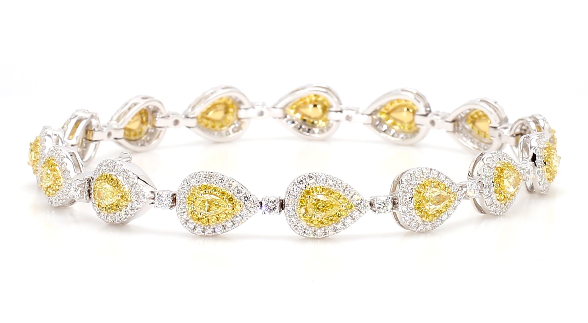 This Fancy Yellow Diamond Link Bracelet with a double diamond halo is a testament to fine craftsmanship and timeless design. Perfect for those who appreciate the beauty of natural diamonds, this bracelet offers a balance of luxury and tasteful