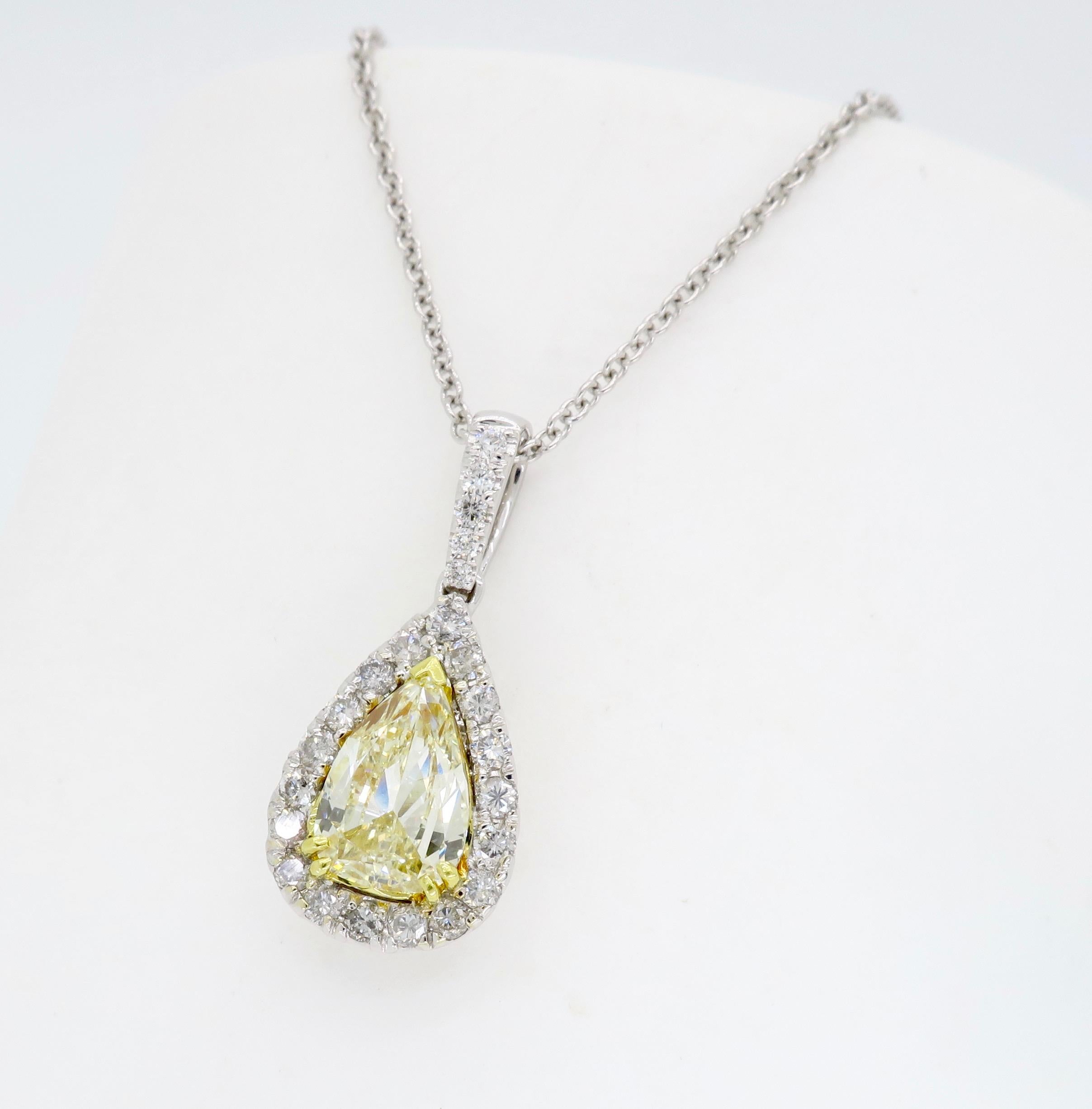 Beautiful halo style diamond necklace featuring an approximately 1.02CT Light Yellow Pear Cut Diamond

Center Diamond Carat Weight: Approximately 1.02CT Pear Cut
Total Diamond Carat Weight:  Approximately 1.35ctw
Color: Light Yellow 
Clarity: