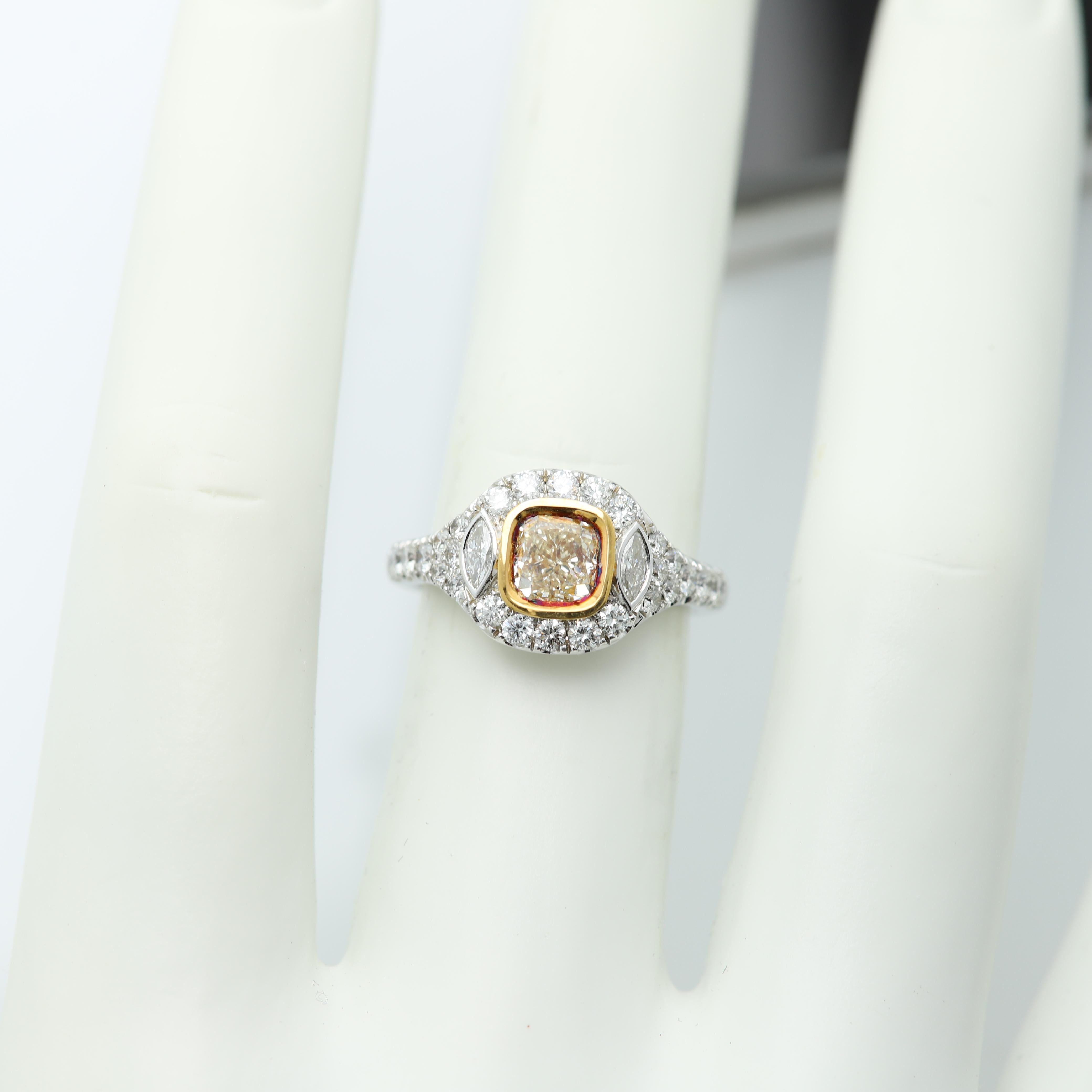 Art Deco Style & Bold Statement Colorful Ring
Center is Light Yellow Diamond sides have regular white Diamonds
All stones are Natural
18k Two Tone Gold 
Light Yellow Diamond size - 1.04 carat cusion cut (6x6 mm) - SI set in cup/bezel setting
Small