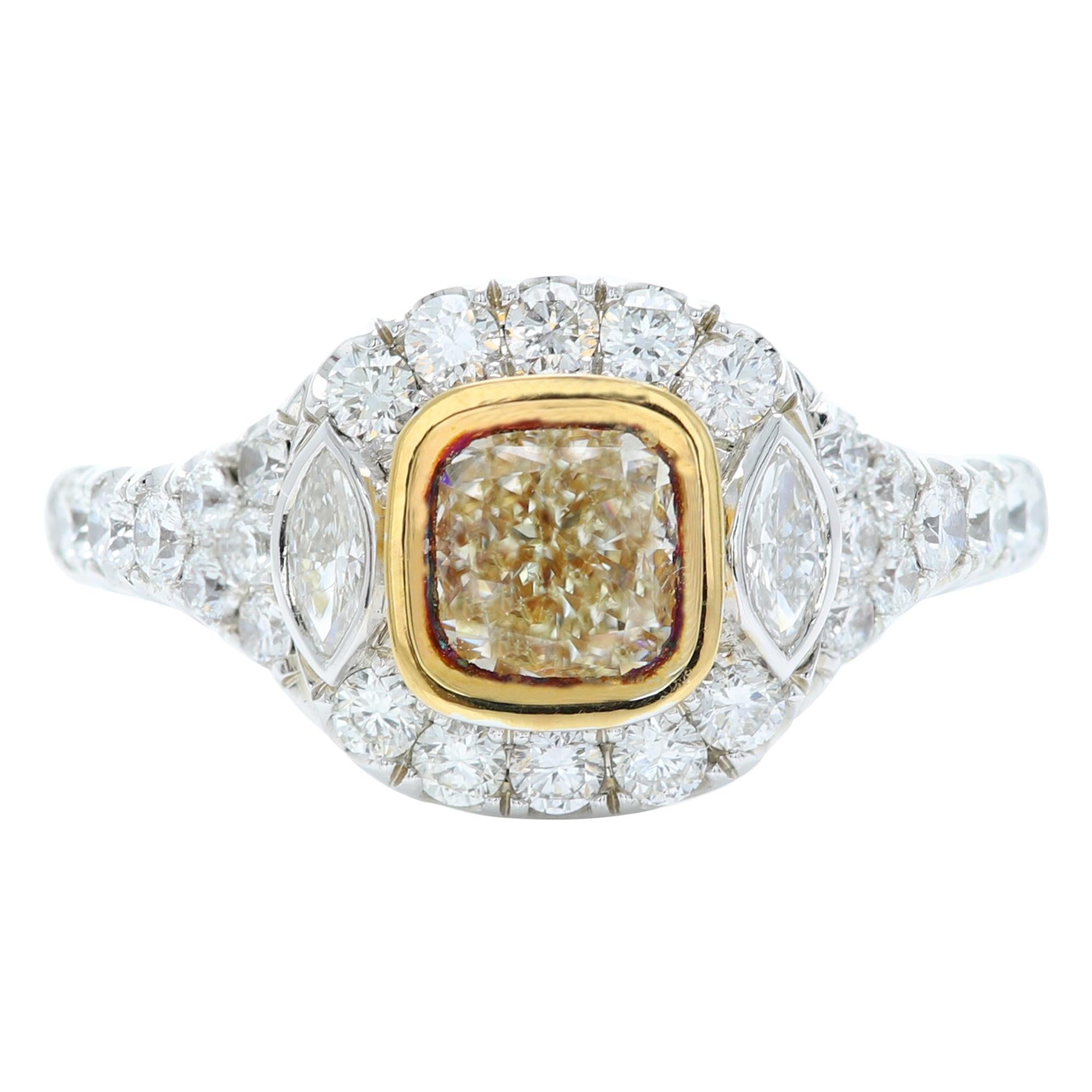 Bague en or bicolore 18 carats avec diamant jaune et diamant central de 1,04 carat