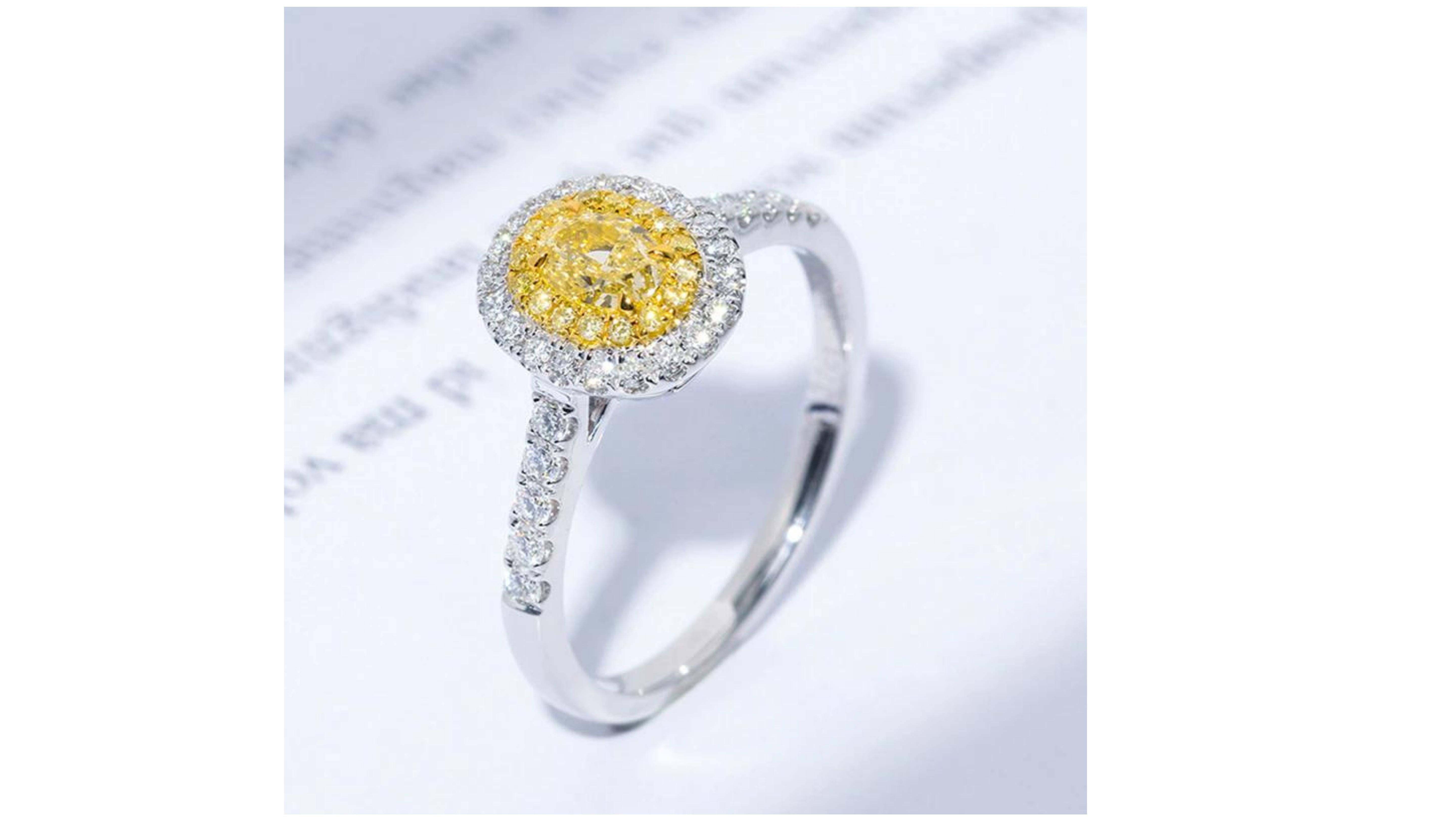 Contemporary Yellow Diamond Ring 18 Karat White Gold For Sale