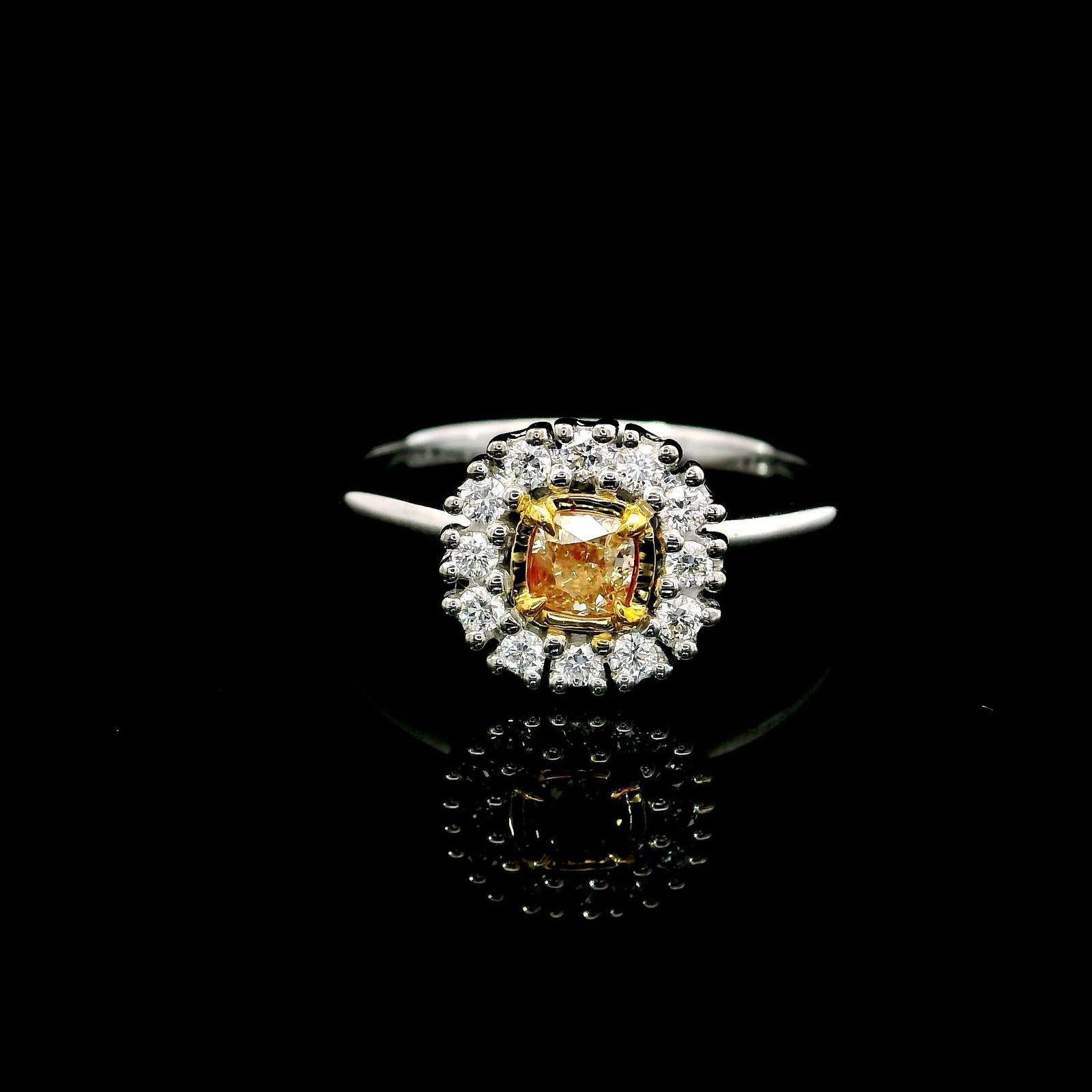 18kt white gold ring with diamonds
  
  Gold colour & karat: White gold 18kt
  Weight: 4.07 grams
  
  Set with-
  Stone type: Diamonds
  Shape: Cushion
  Carat: 0.22
  Colour: Yellow
  Clarity: -
  
  Surrounding Stones: Diamonds
 1) Side White