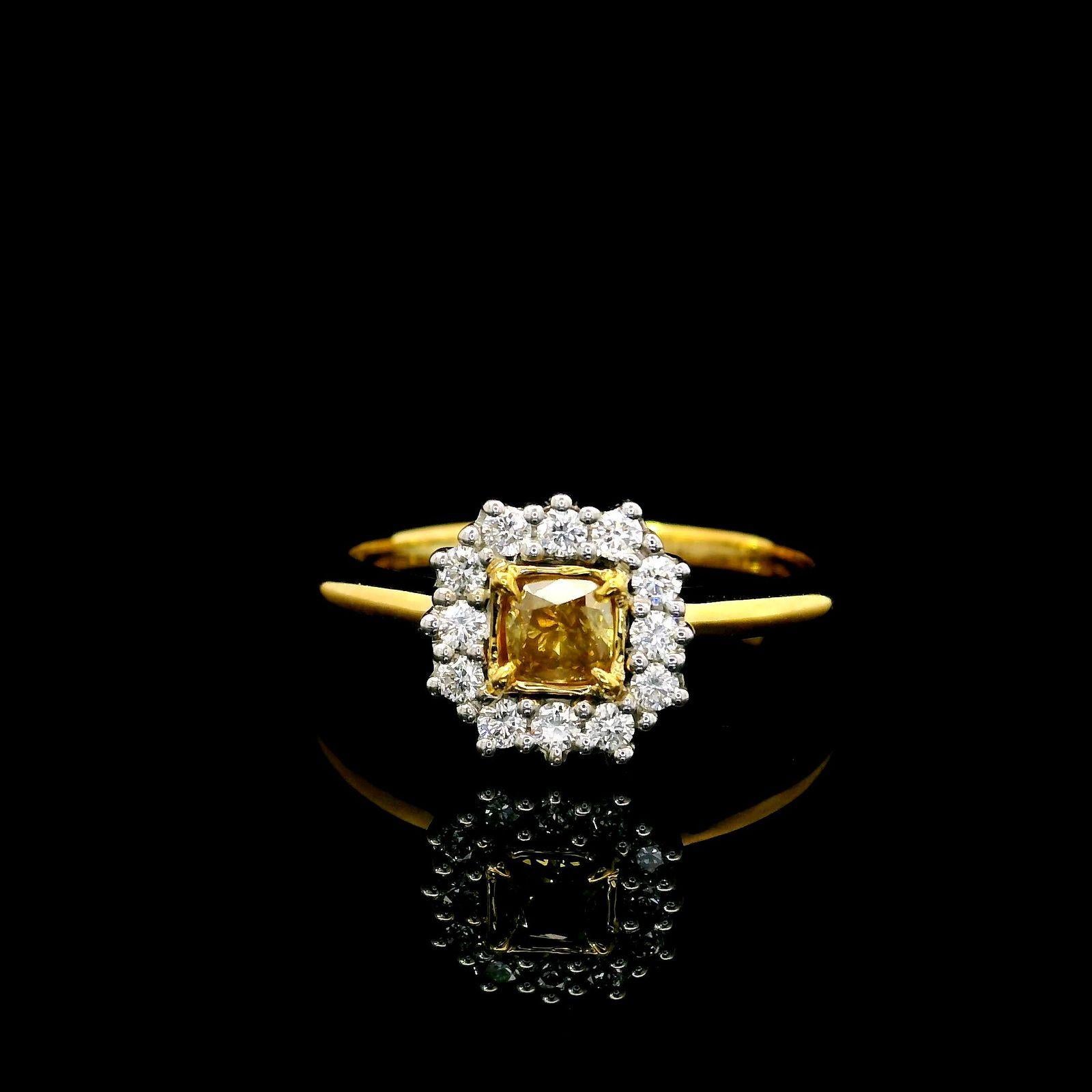 18kt white gold ring with diamonds
  
  Gold colour & karat: White gold 18kt
  Weight: 3.89 grams
  
  Set with-
  Stone type: Diamonds
  Shape: Cushion
  Carat: 0.24
  Colour: Yellow
  Clarity: -
  
  Surrounding Stones: Diamonds
 1) Side White