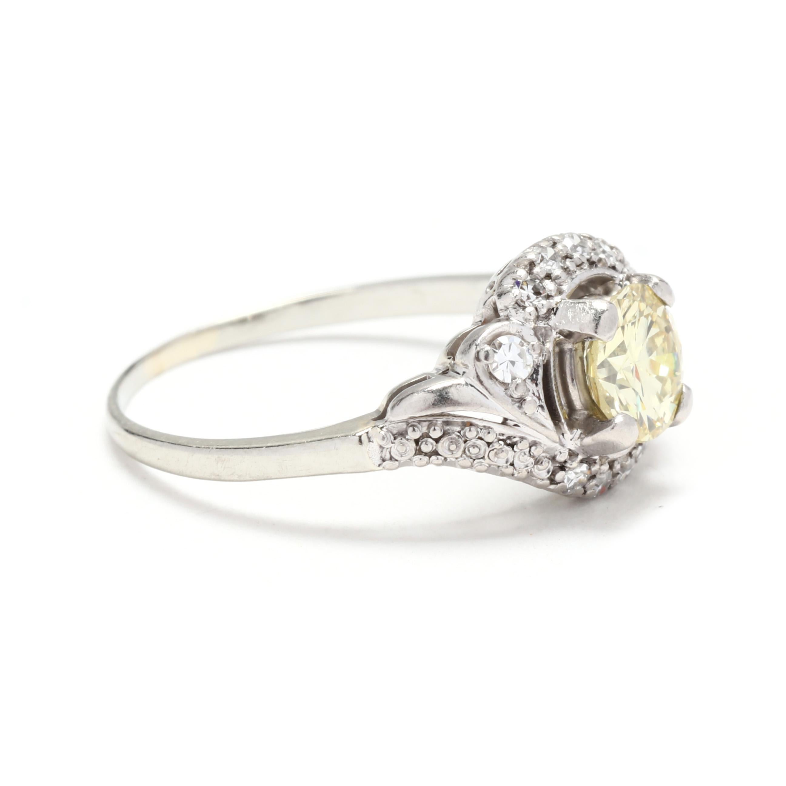 Stones:
- diamond
- round brilliant cut, 1 stone
- 5.75 mm
- approximately .75 carat
- Fancy Yellow, VS2 clarity
- single cut round, 10 stones
- 1.3 - 1.75 mm
- approximately .10 total carats
- F-G color, VS clarity

Ring Size 6.5

Width: 9.6 mm

