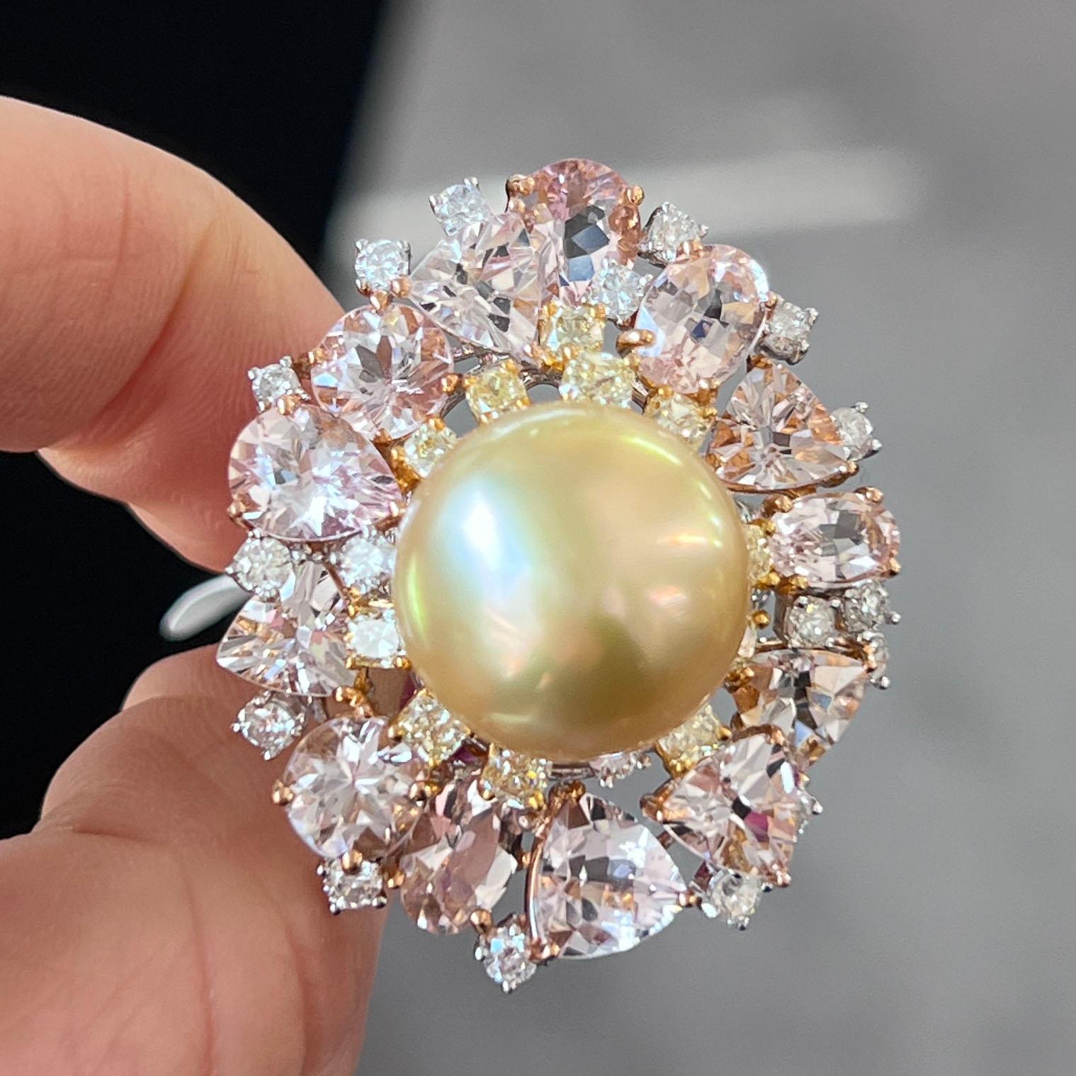 Stunning Yellow diamond, white diamond, morganite pearl cocktail cluster ring. The center showcases a 14.8mm eye-catching yellow pearl, surrounded by a beautiful masterpiece of morganite, yellow, and white diamonds. 
9.38 carats of morganite and