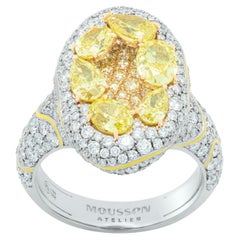 Bague haute joaillerie en or blanc 18 carats, diamants jaunes et diamants blancs émaillés