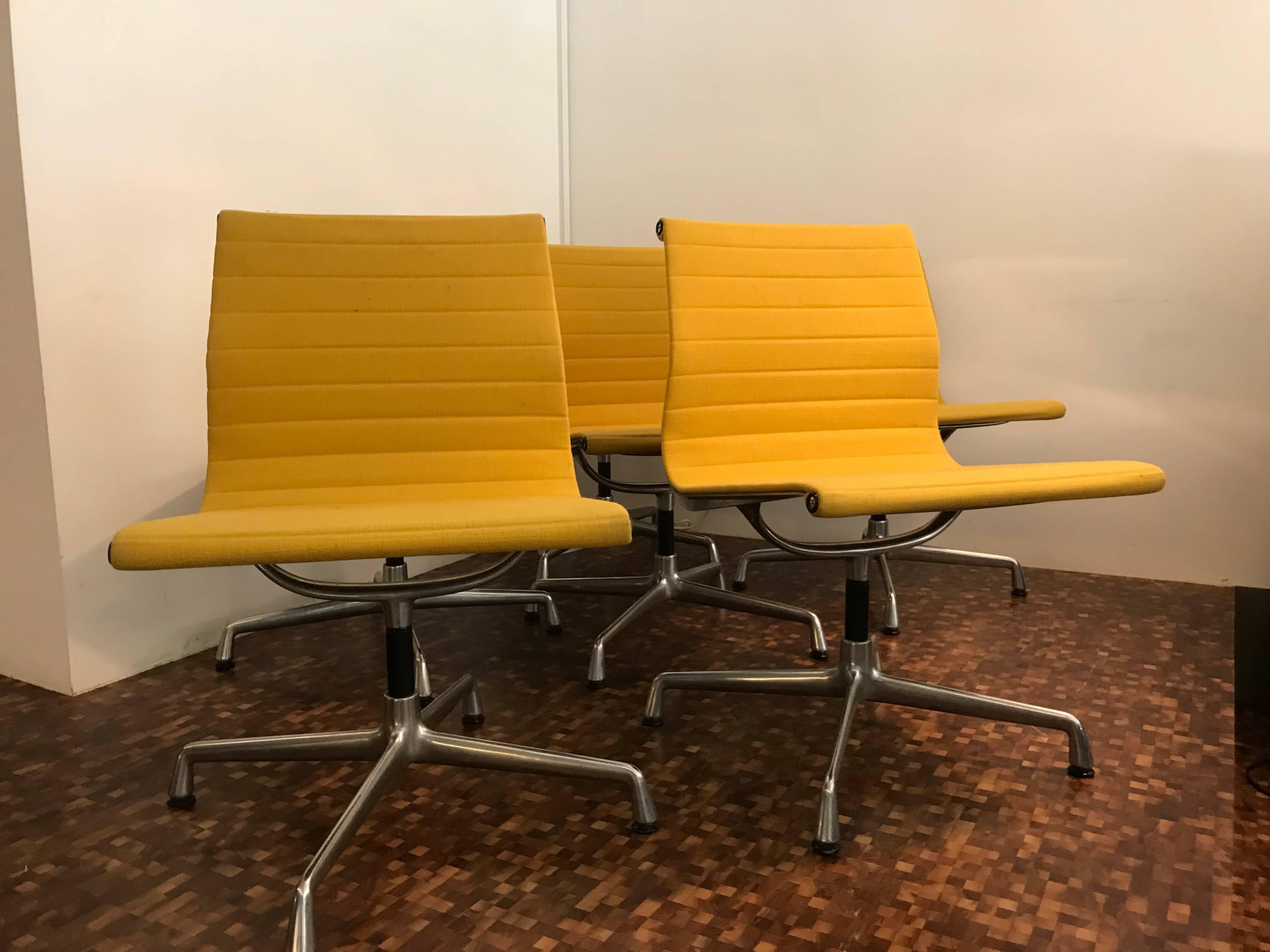 Yellow Ea101 chairs by Charles & Ray Eames for Vitra, 1968, set of six.