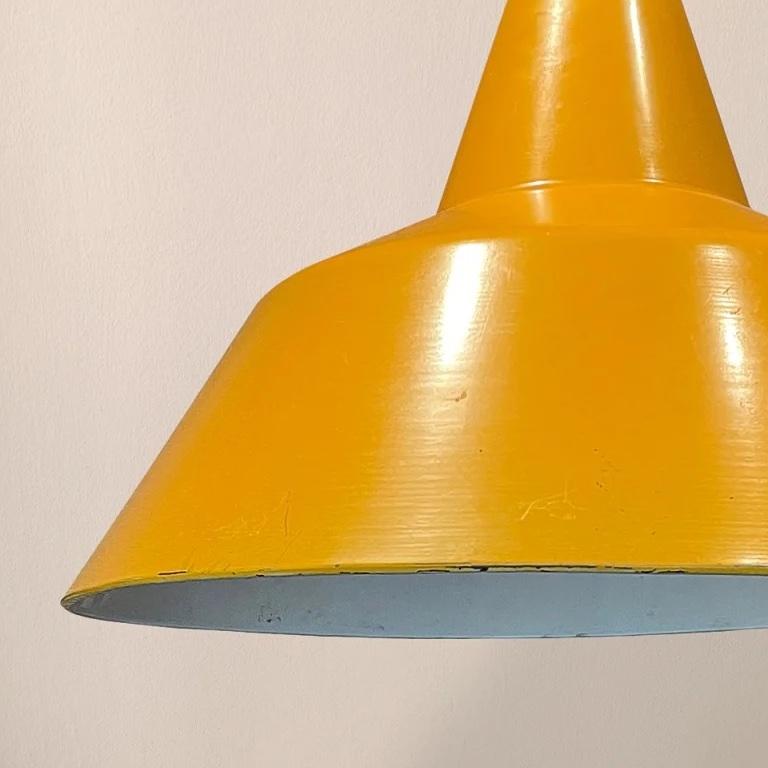 Yellow enamelled metal hanging light, excellent scale. French 1960s, measures 35cm H x 45cm W.