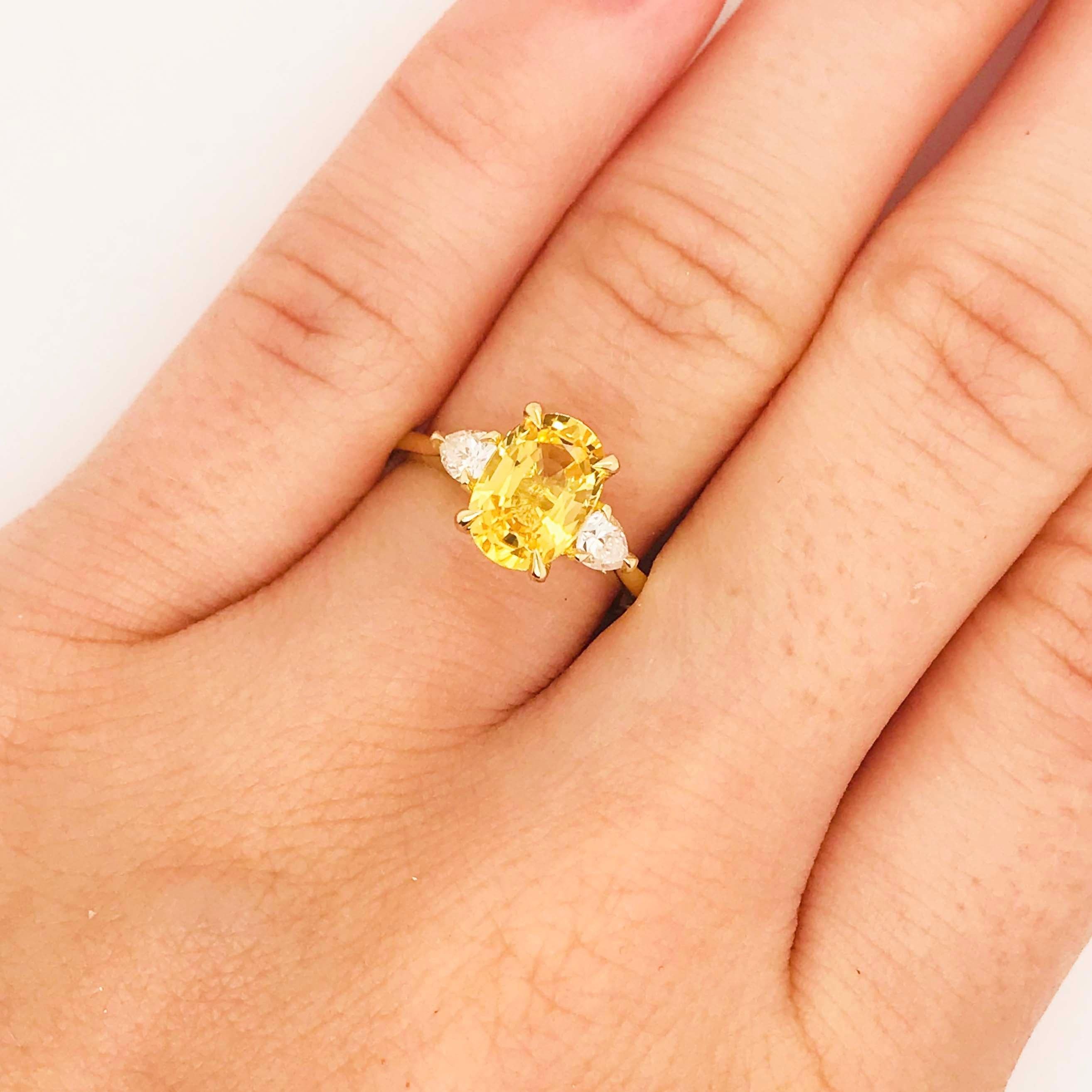 For Sale:  Yellow Engagement Ring Sapphire 2.33 Carat 18 Karat Three-Stone Diamonds 2