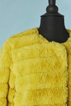 Yellow faux fur edge to edge coat with laser cut and pocket on both side