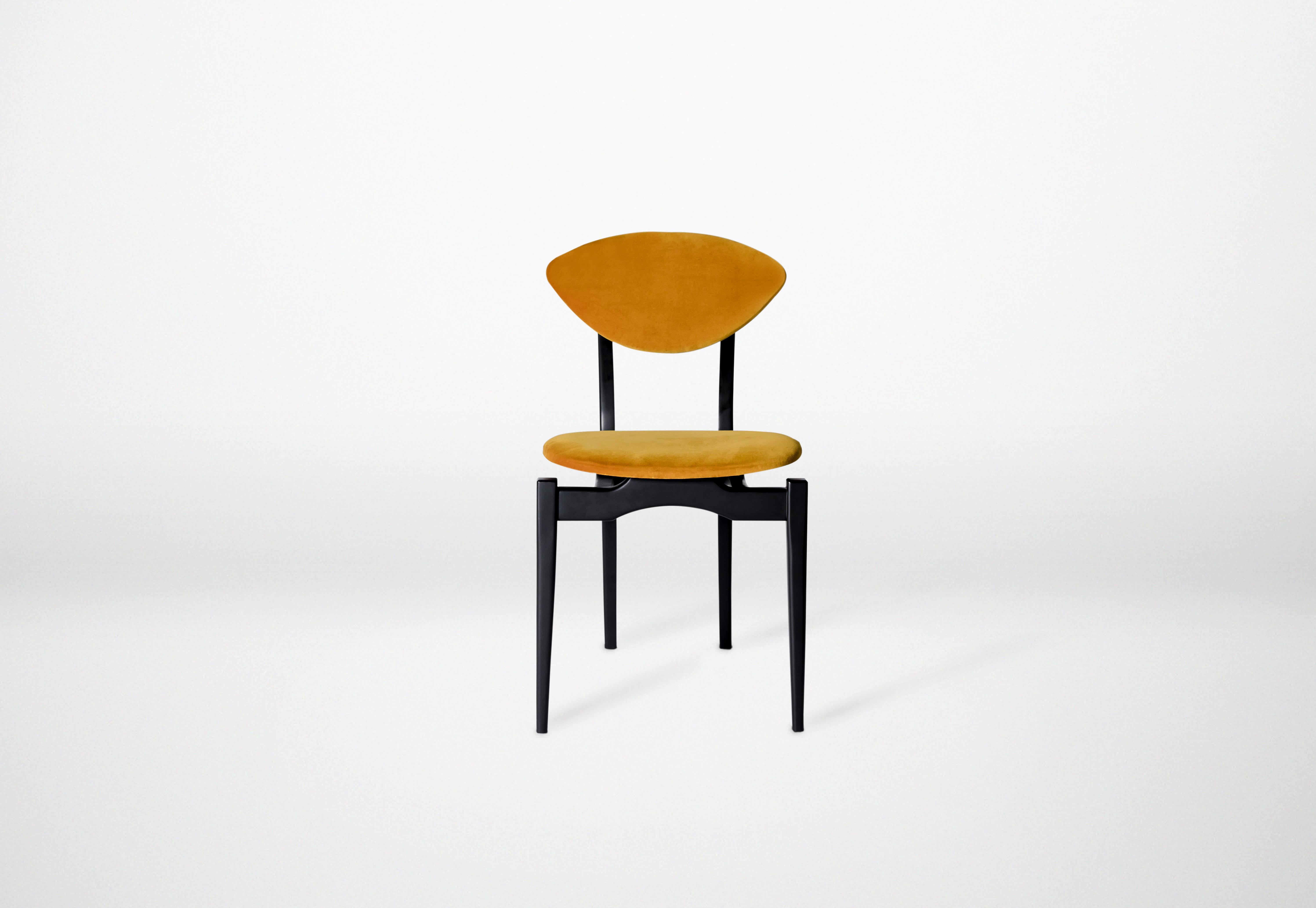 Yellow Femur dining chair by Atra Design.
Dimensions: D 58.5 x W 45 x H 85 cm.
Materials: fabric, walnut.
Available in leather or fabric seat and in other colors.

Atra Design
We are Atra, a furniture brand produced by Atra form a mexico