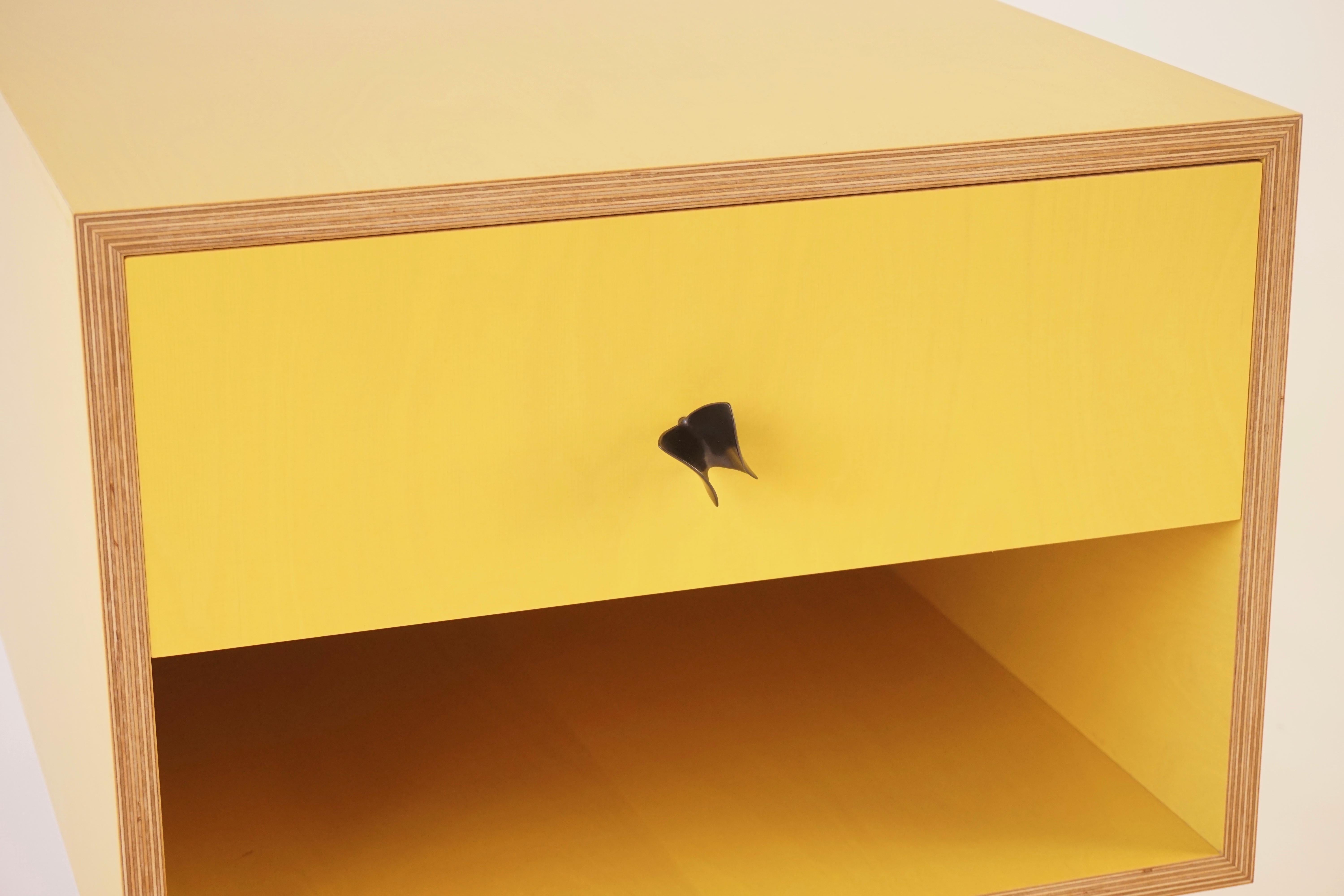 American Yellow Finn Ply Bedside Tables with Bronze Base and Bronze Butterfly Pulls For Sale