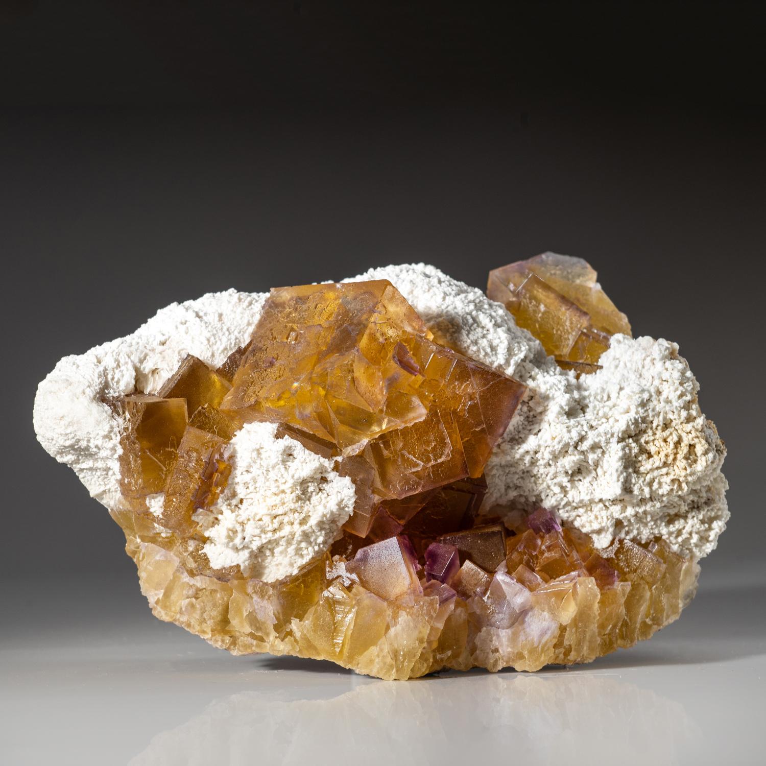 From Elmwood Mine, Carthage, Smith County, Tennessee

Very aesthetic large transparent cubic fluorite crystals with white barite overgrown on yellow fluorite crystals.


Weight: 6.5 lbs, Dimensions: 7 x 6 x 4 inches