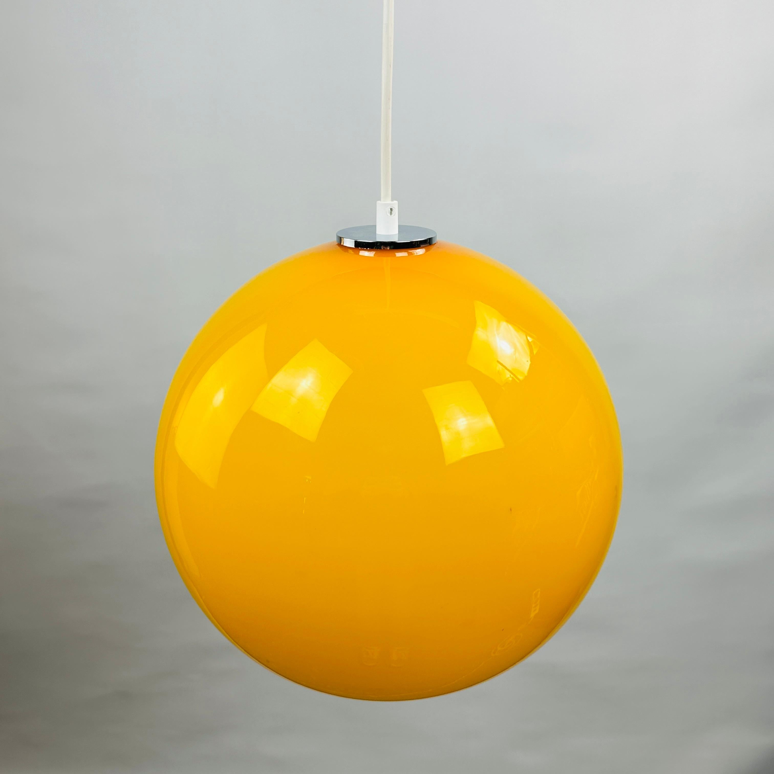 Yellow glass globe pendant light XL by Peill and Putzler 1960 For Sale 1