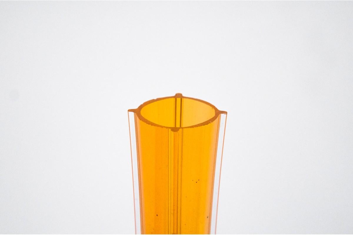 Yellow glass vase
Produced in Poland in 1970s. 
Very good condition
Dimensions: Height 40 cm / width 7.5 cm / depth. 7.5 cm.
  
 
