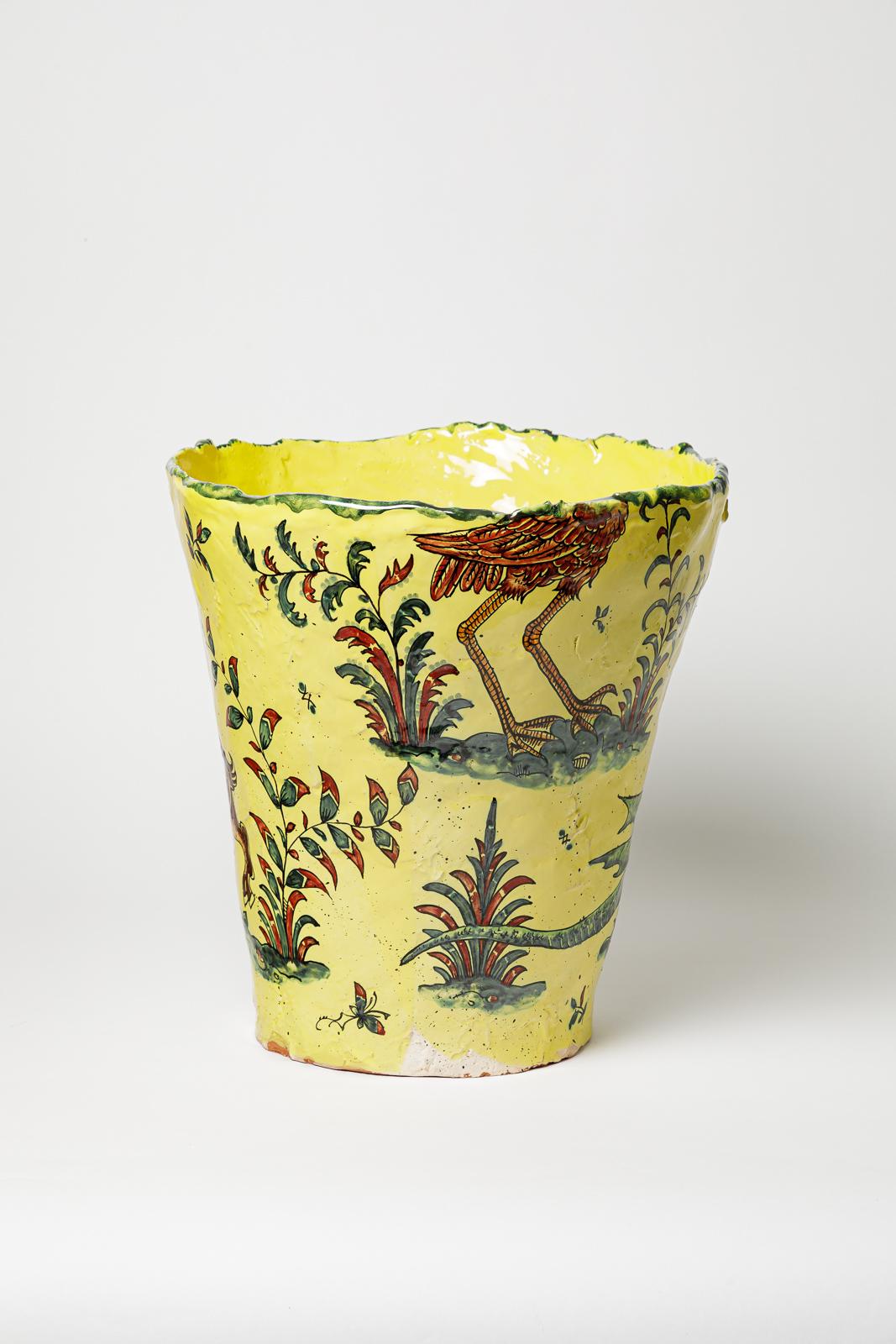 Francese Yellow glazed earthenware vase, decorated with fantastical animals, 2025. in vendita