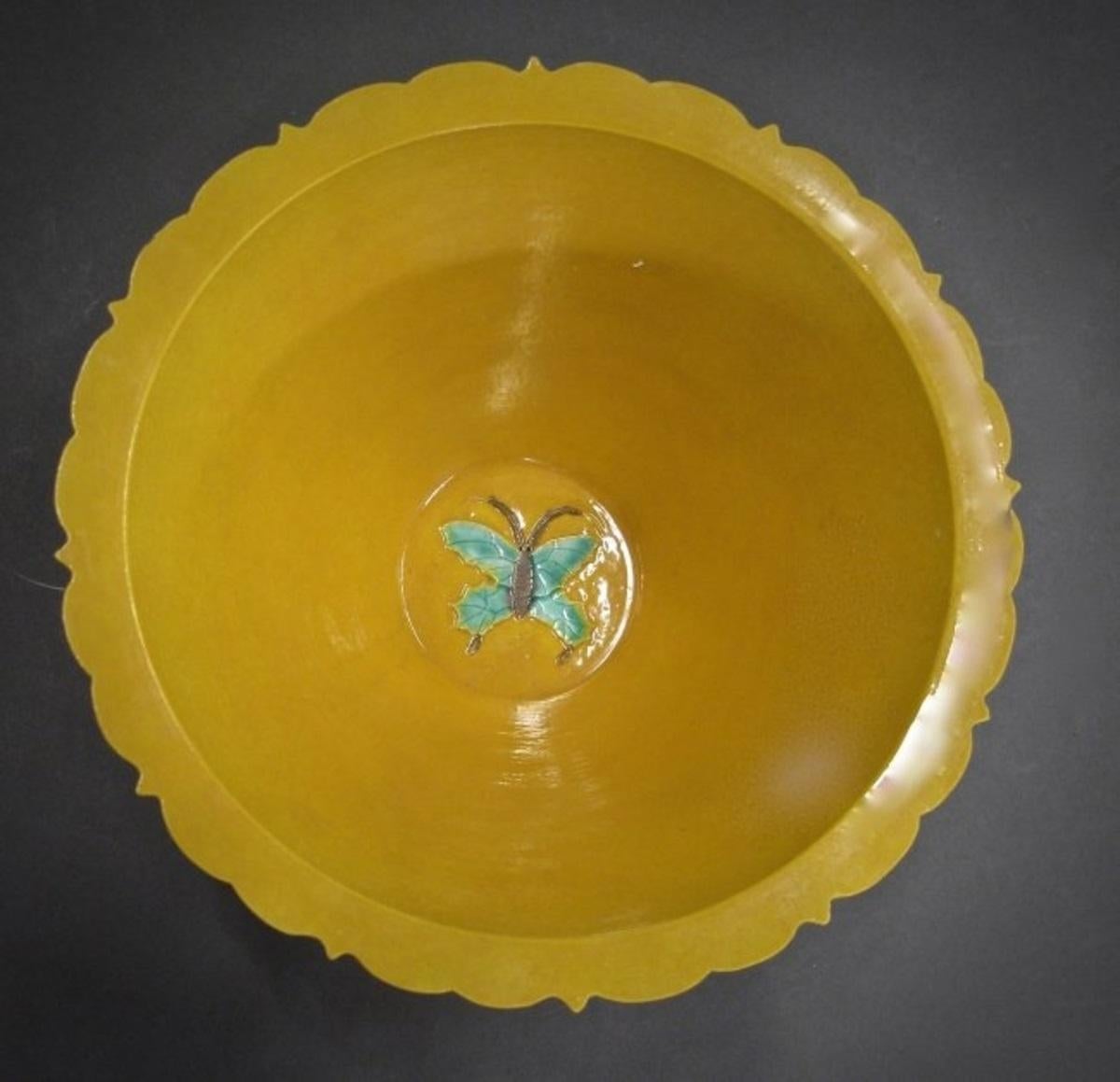 Very fine yellow glazed porcelain bowl,
Chinese, Guang Xu six-character seal marks and of the period (1875-1914) fine Chinese porcelain yellow glazed conical bowl with serrated edge, carved decoration of enamel ducks in lotus pond in black border